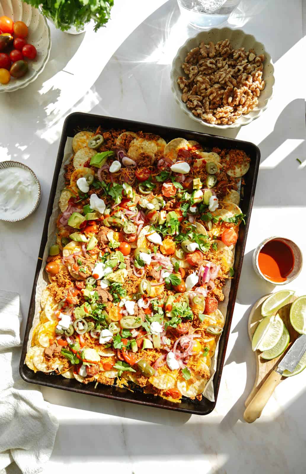 Vegan Taco Meat Nachos on a big baking sheet