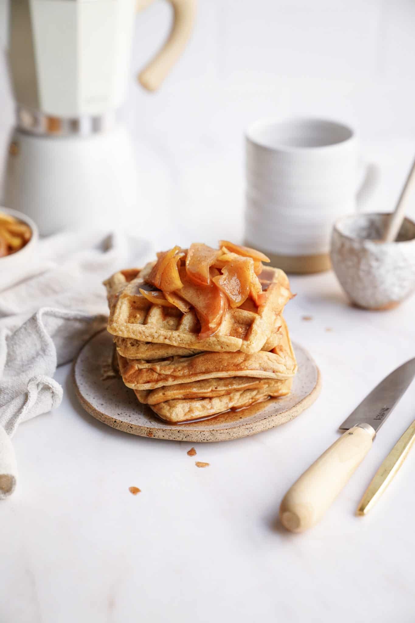 Apple Cinnamon Waffles stacked on a plate