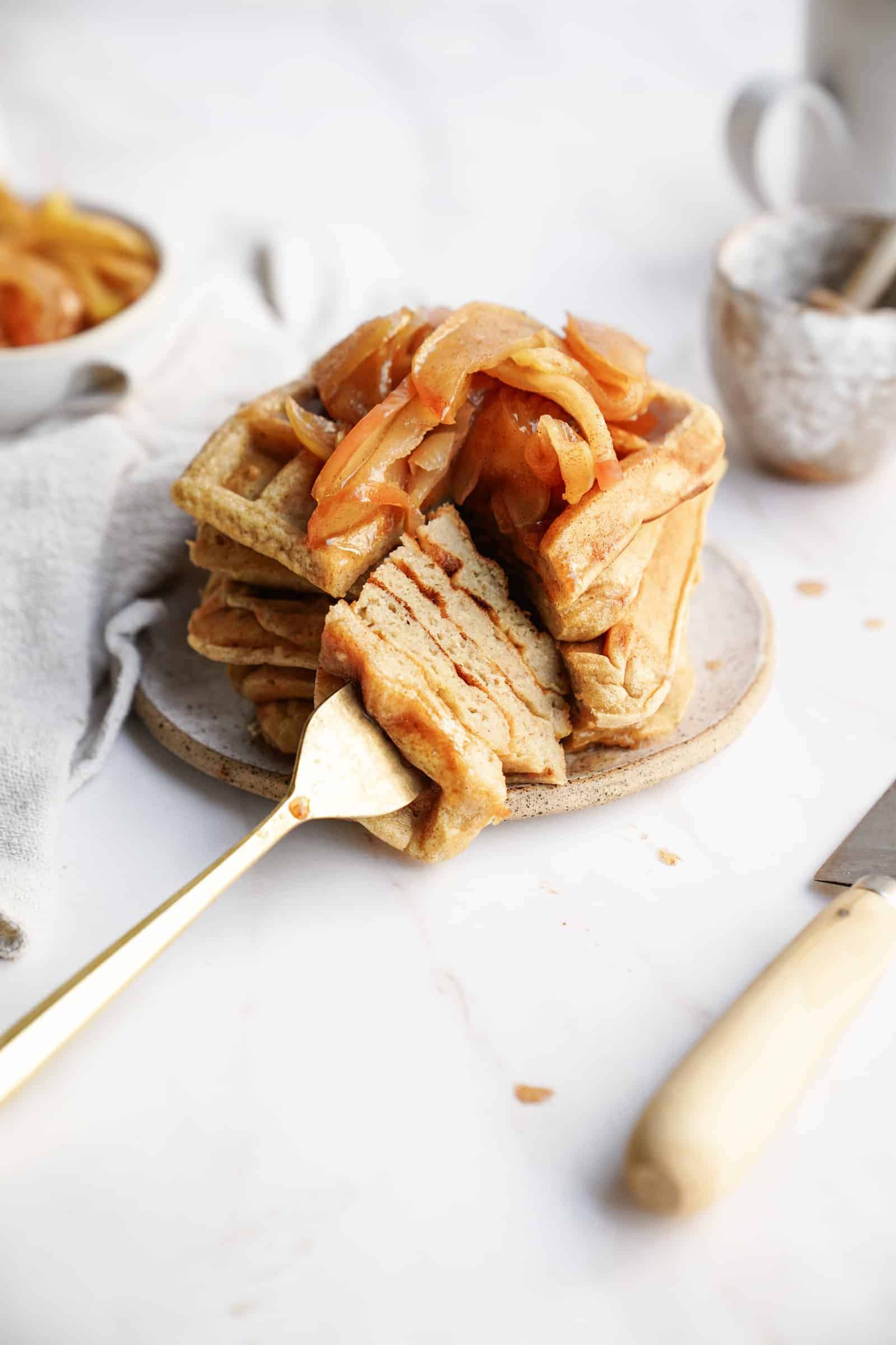 Apple Cinnamon Waffles stacked on a plate