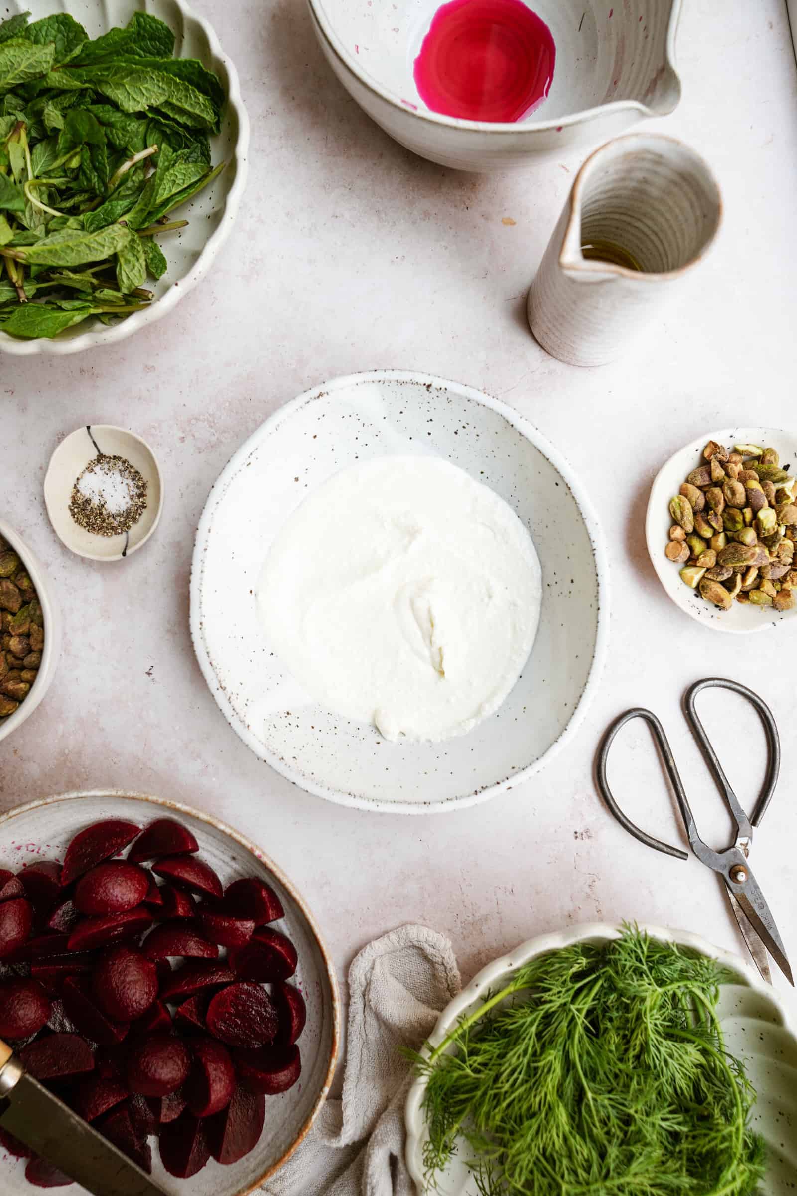 Whipped feta being made in a bowl 