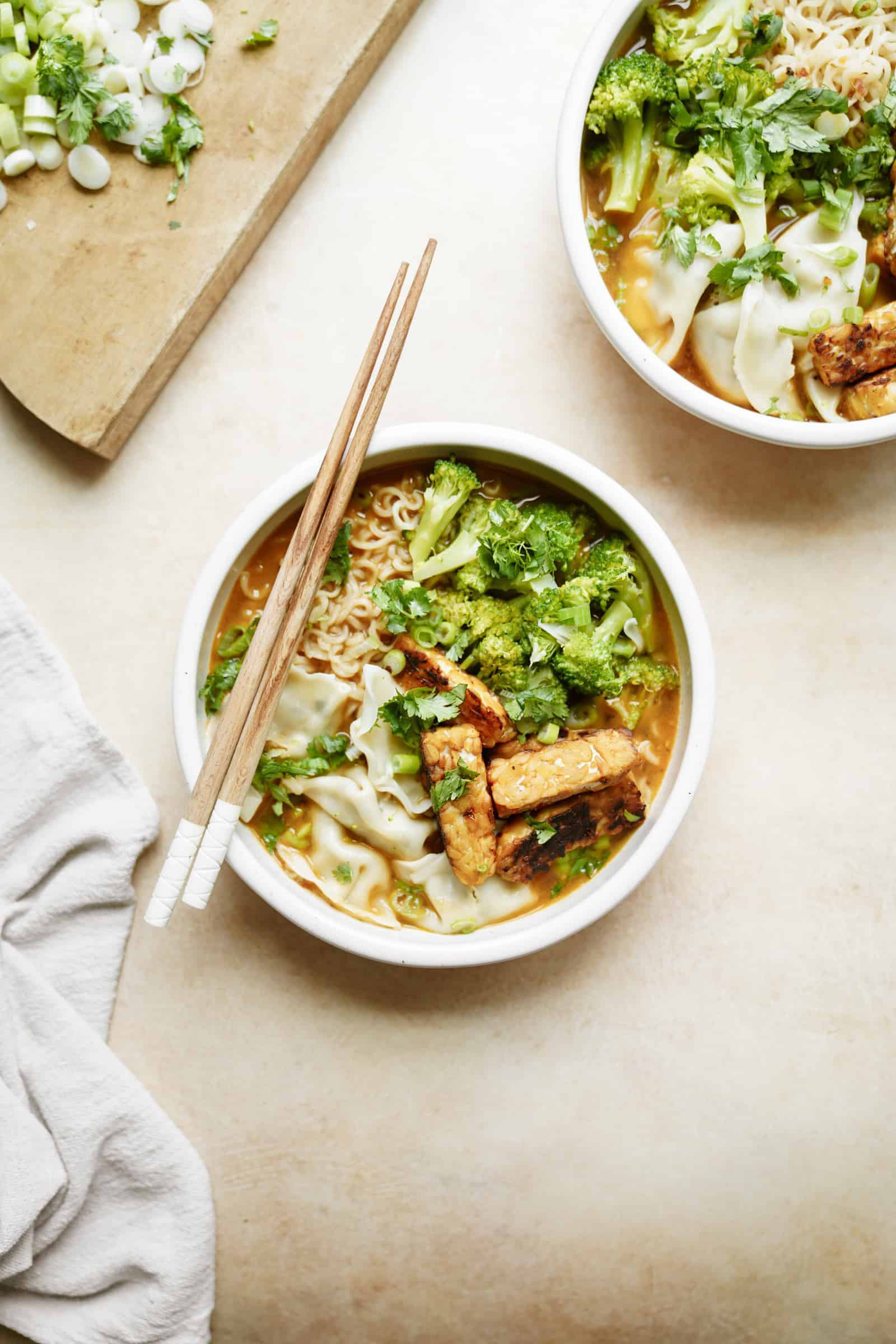 Bowl of creamy vegan ramen with chopsticks