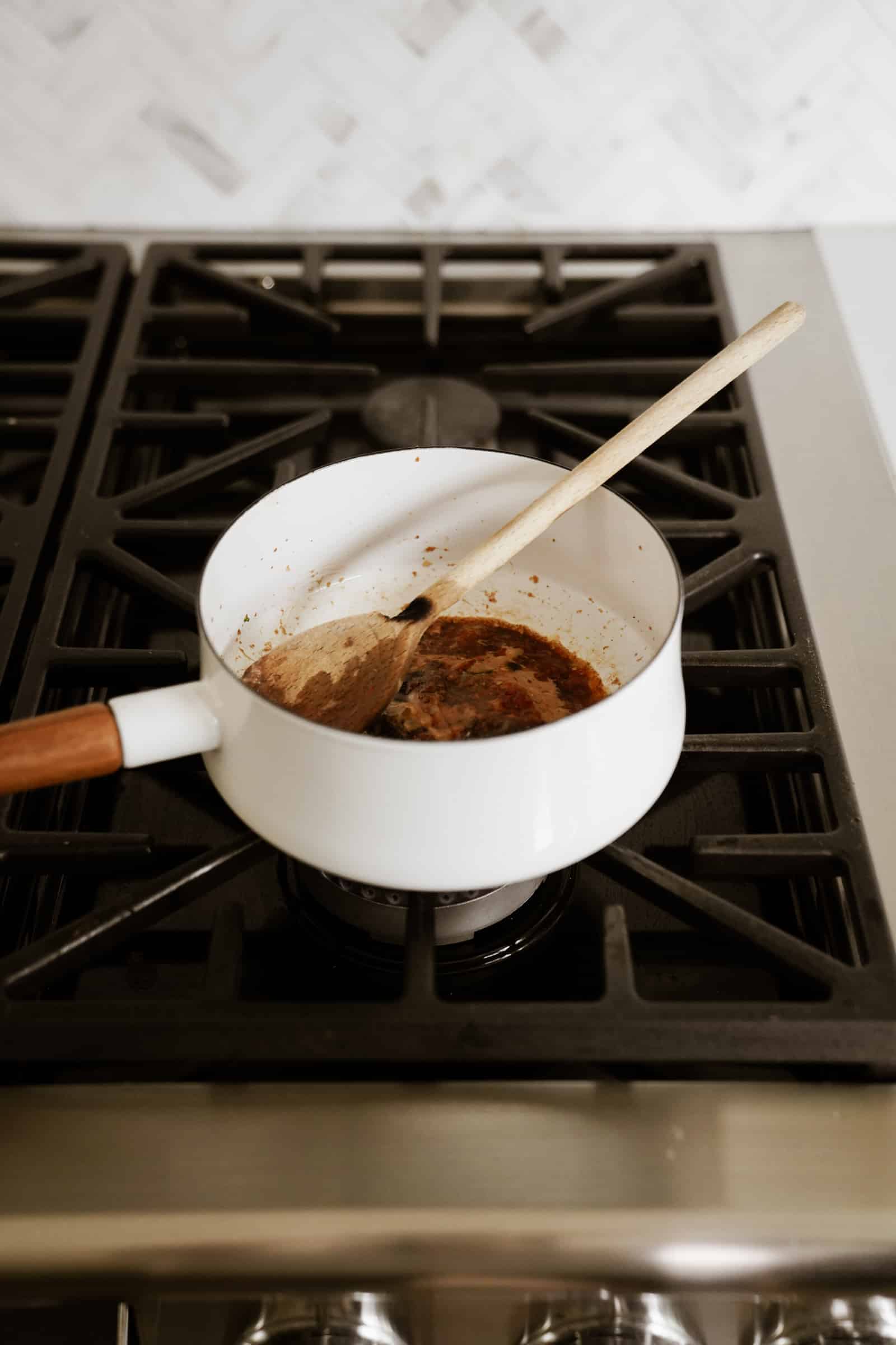 Ingredients for vegan ramen in a pot on the stove