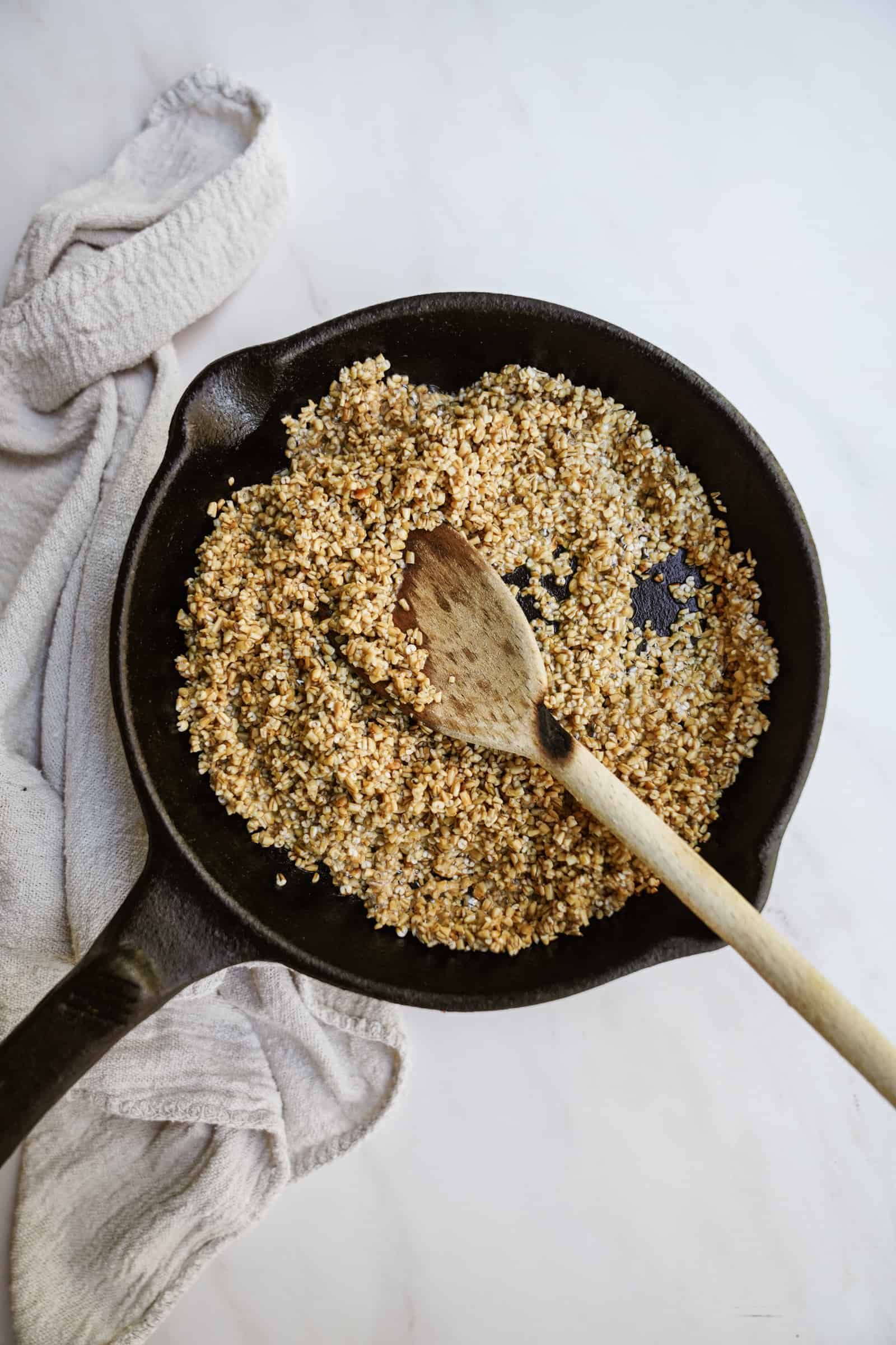 Oats being toasted in a pan