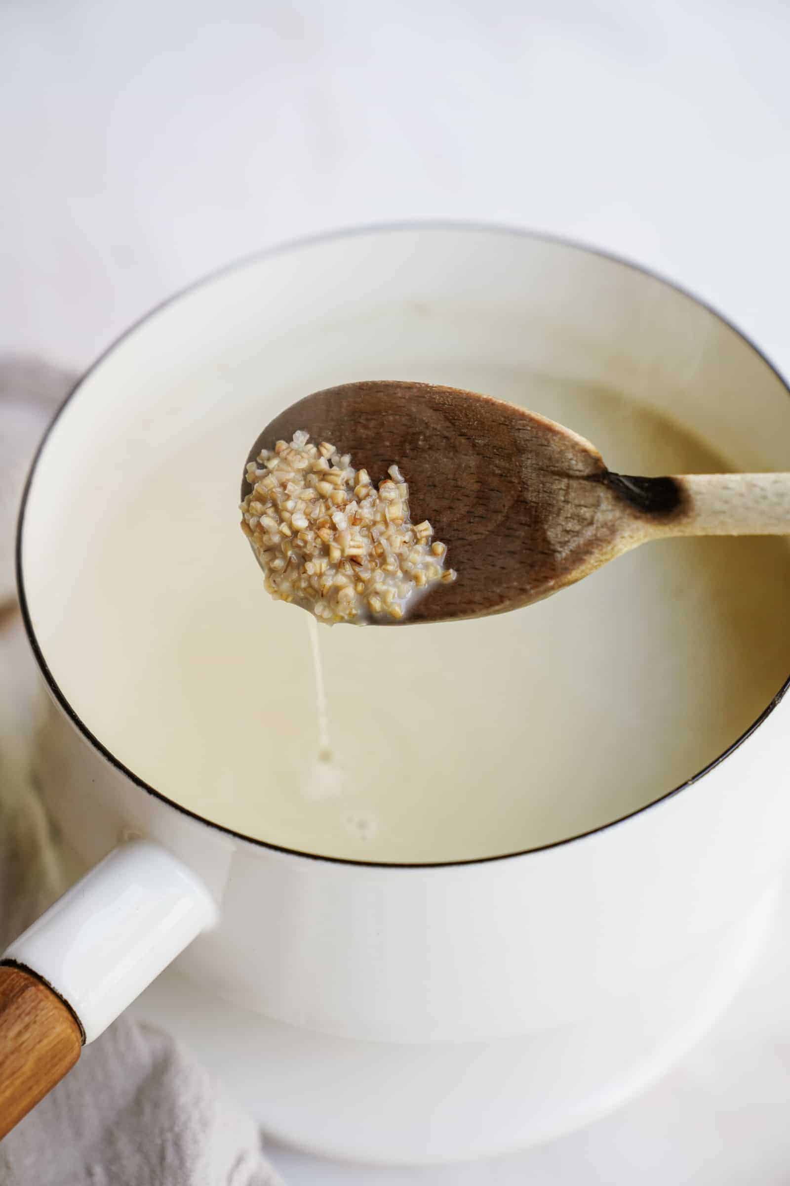 Adding steel cut oats to sauce pan with milk for Savory Steel Cut Oats