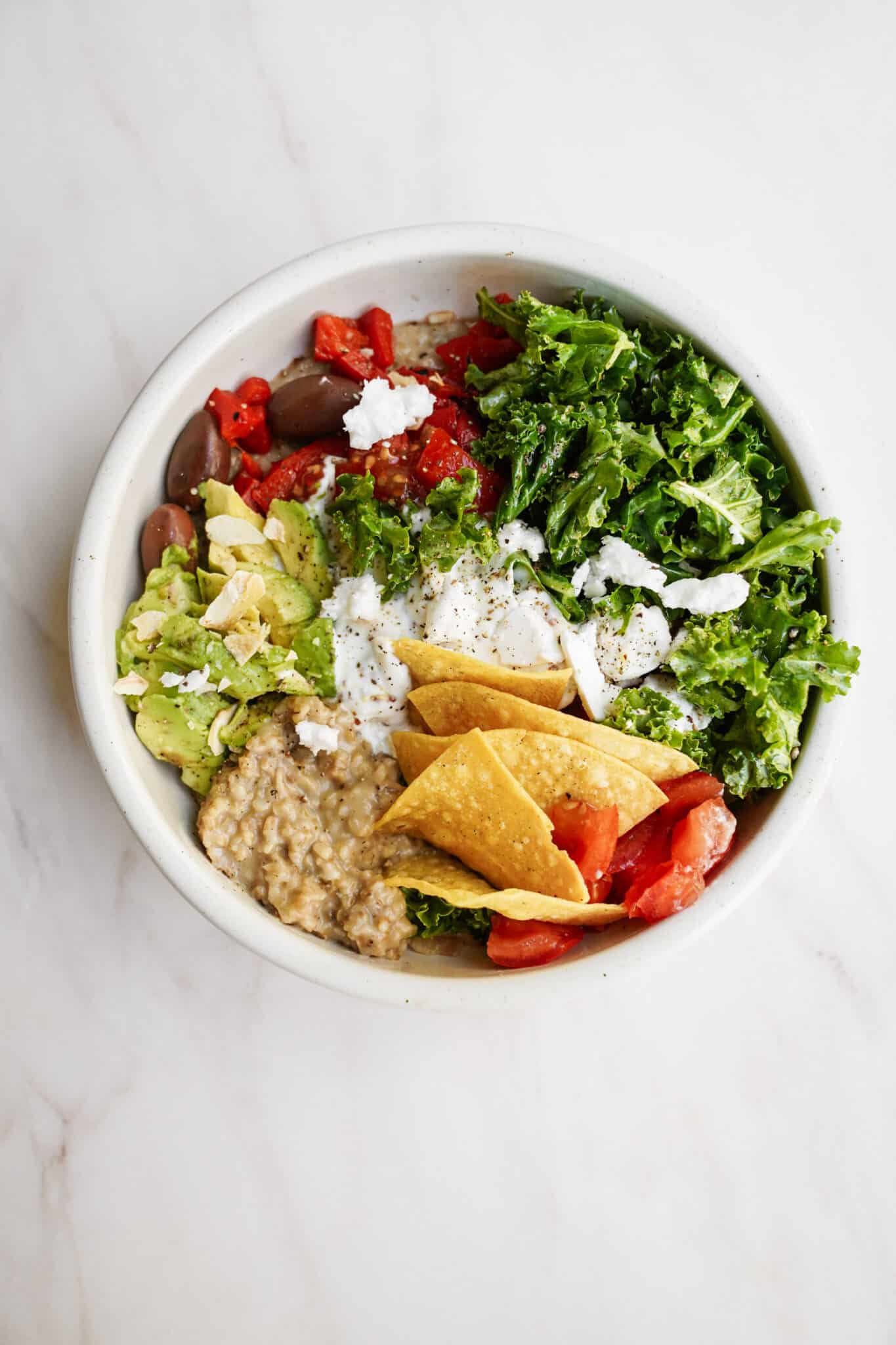 Bowl with all the toppings on it 