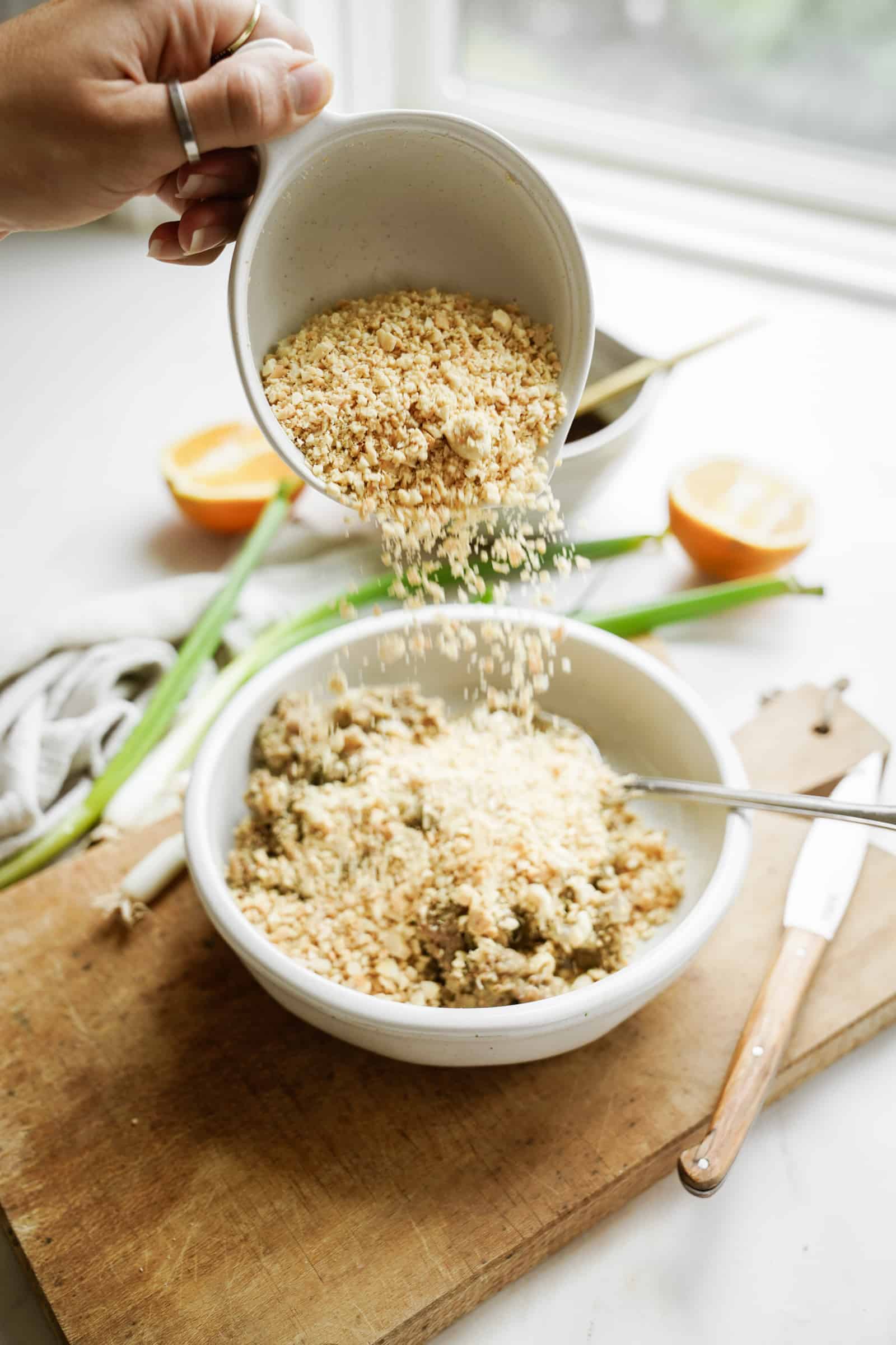 Peanuts being added to ingredients for lentil meatballs