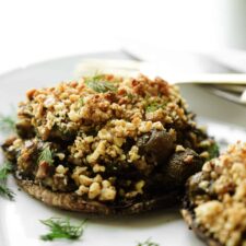 Close up of vegan stuffed portobello mushrooms on plate