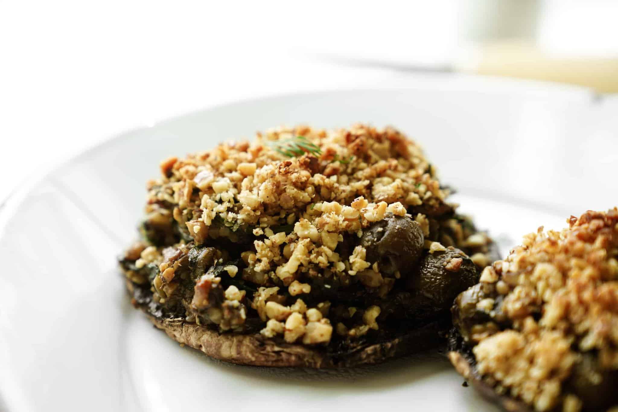 Vegan Stuffed Portobello Mushrooms close-up on a serving plate