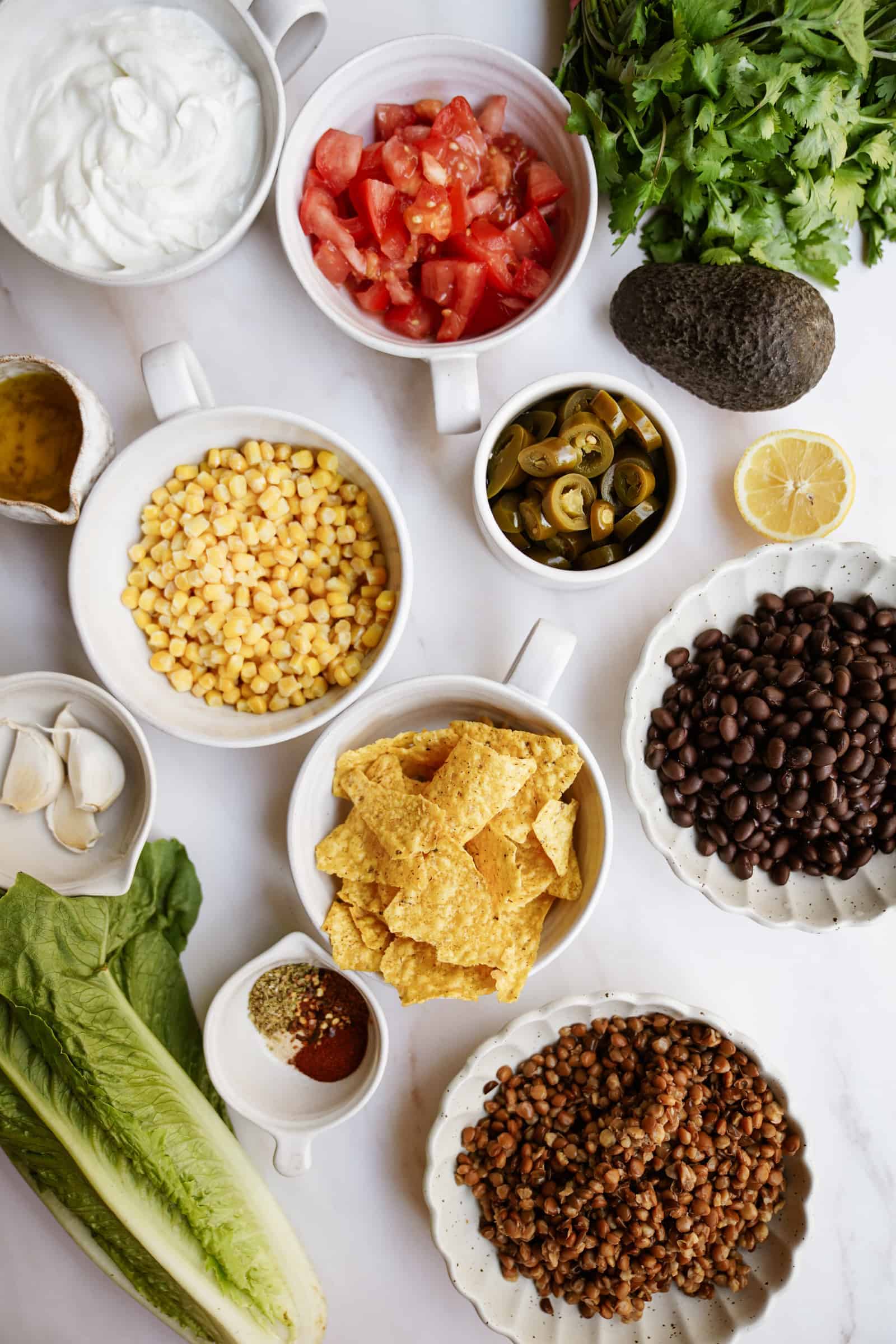 Ingredients for vegan taco salad on a table