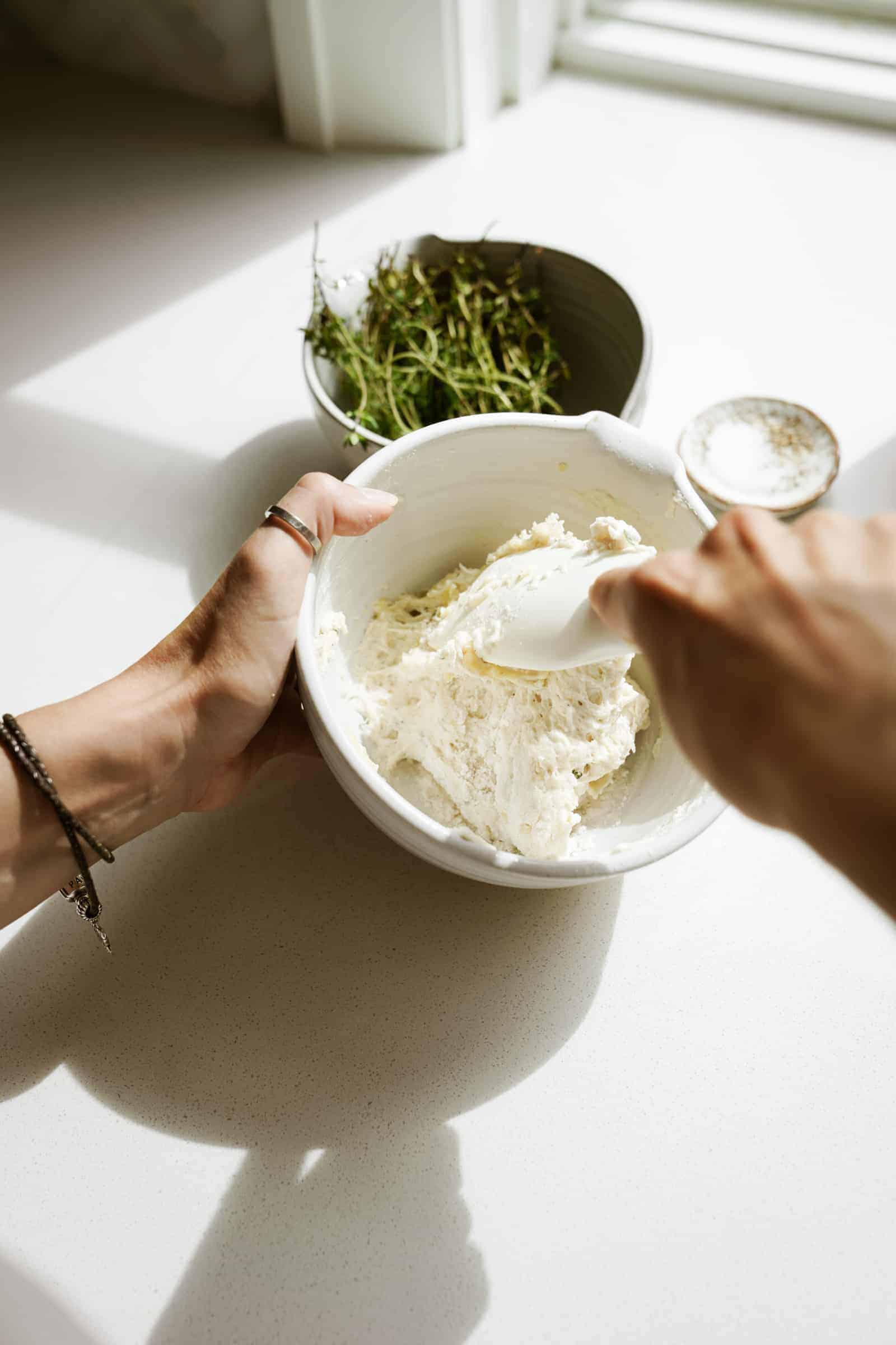 Ingredients for vegan dumplings being mixed in a bowl