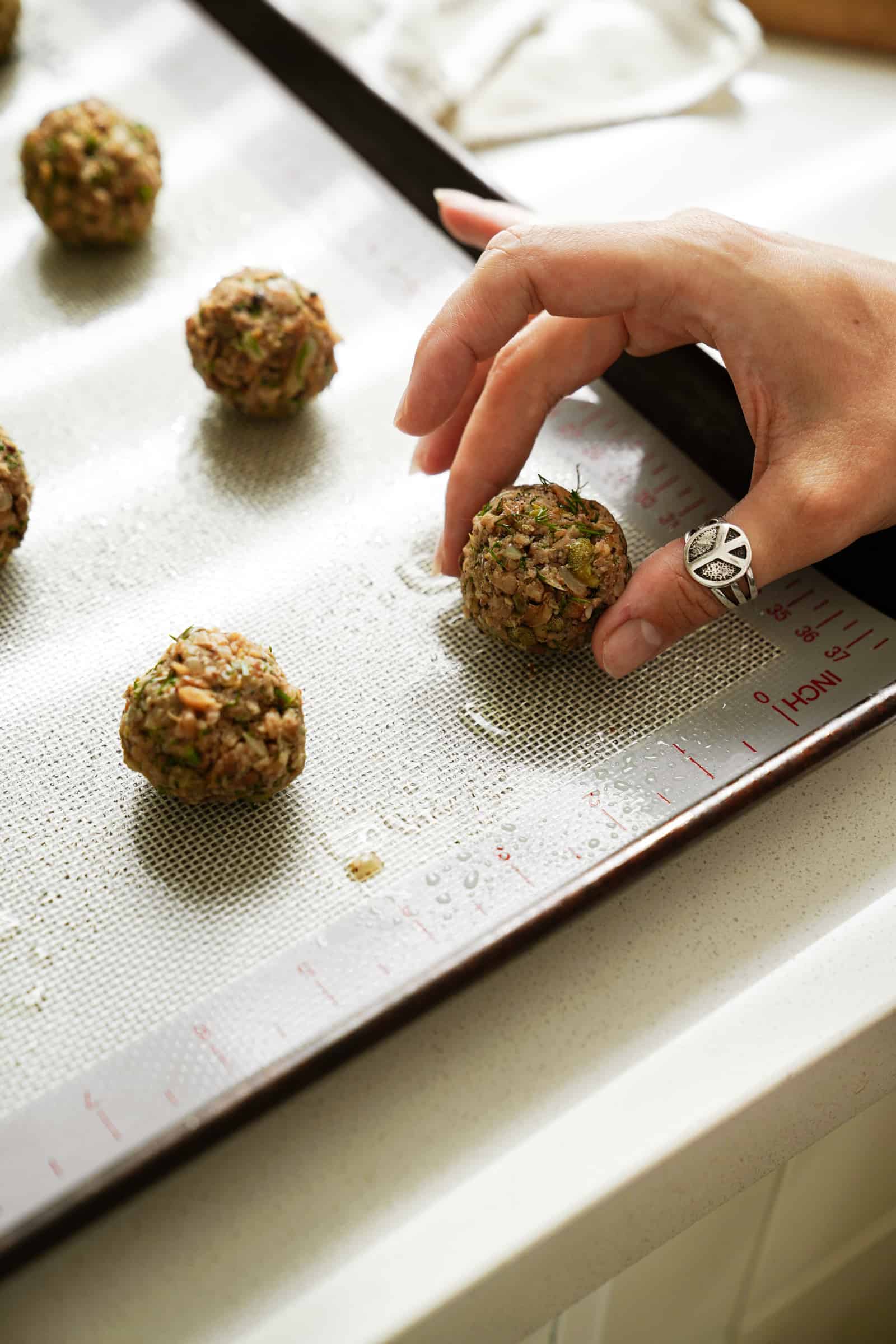 Meatballs on a tray ready to bake