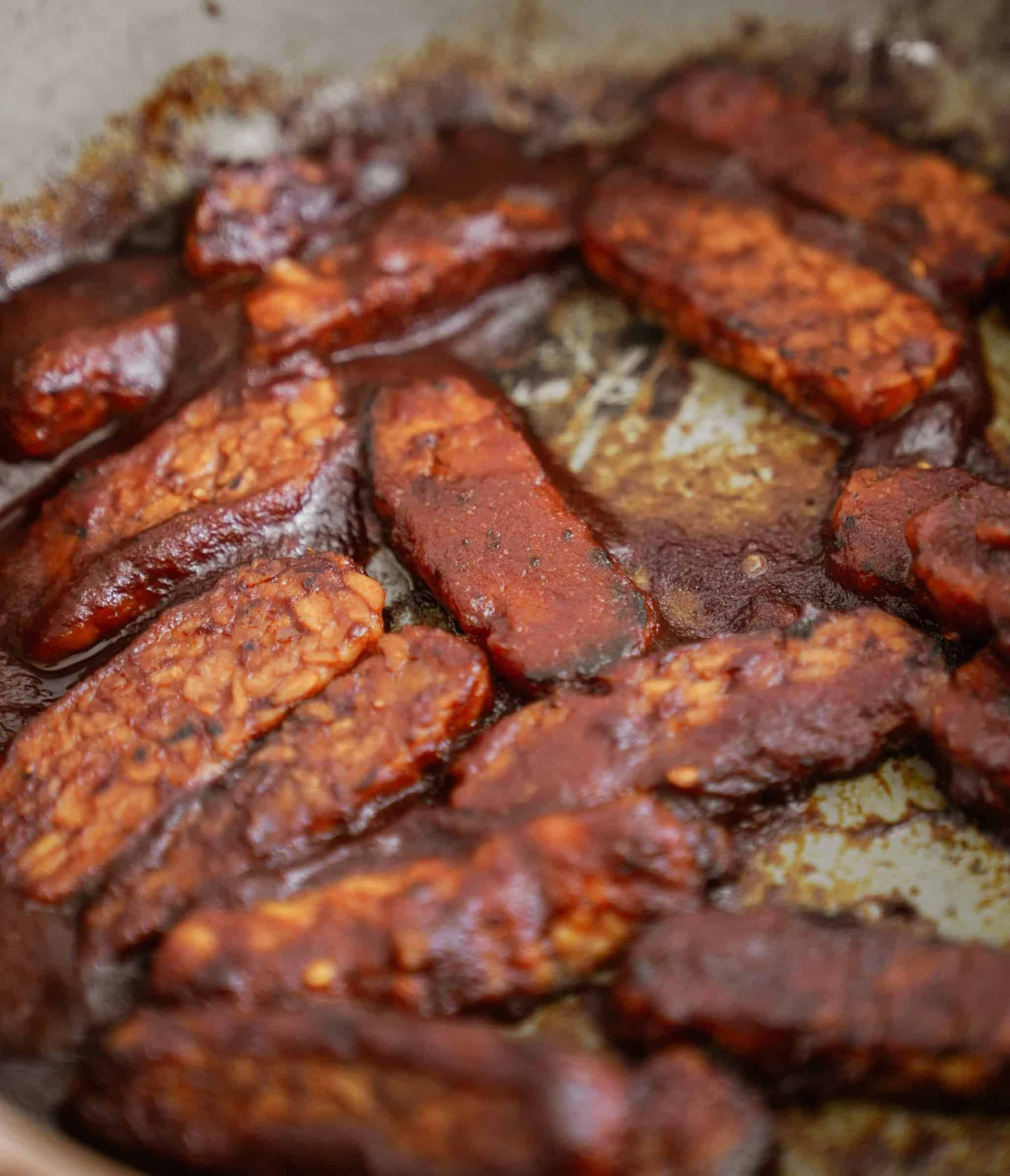 Tempeh cooking in a pan 