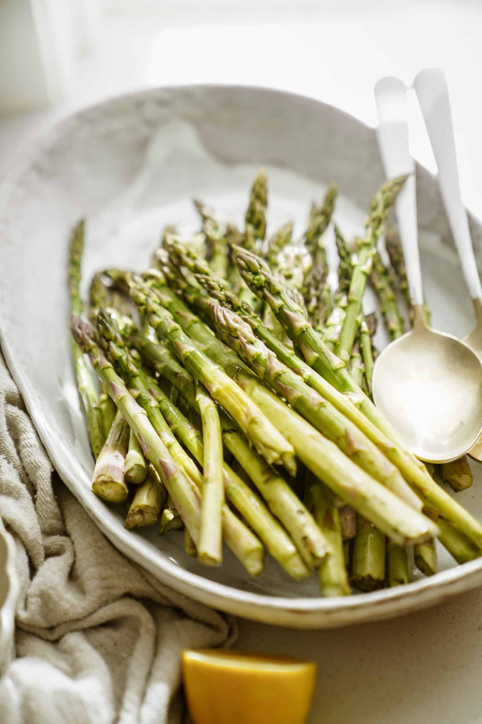 Greek marinated asparagus on a serving dish