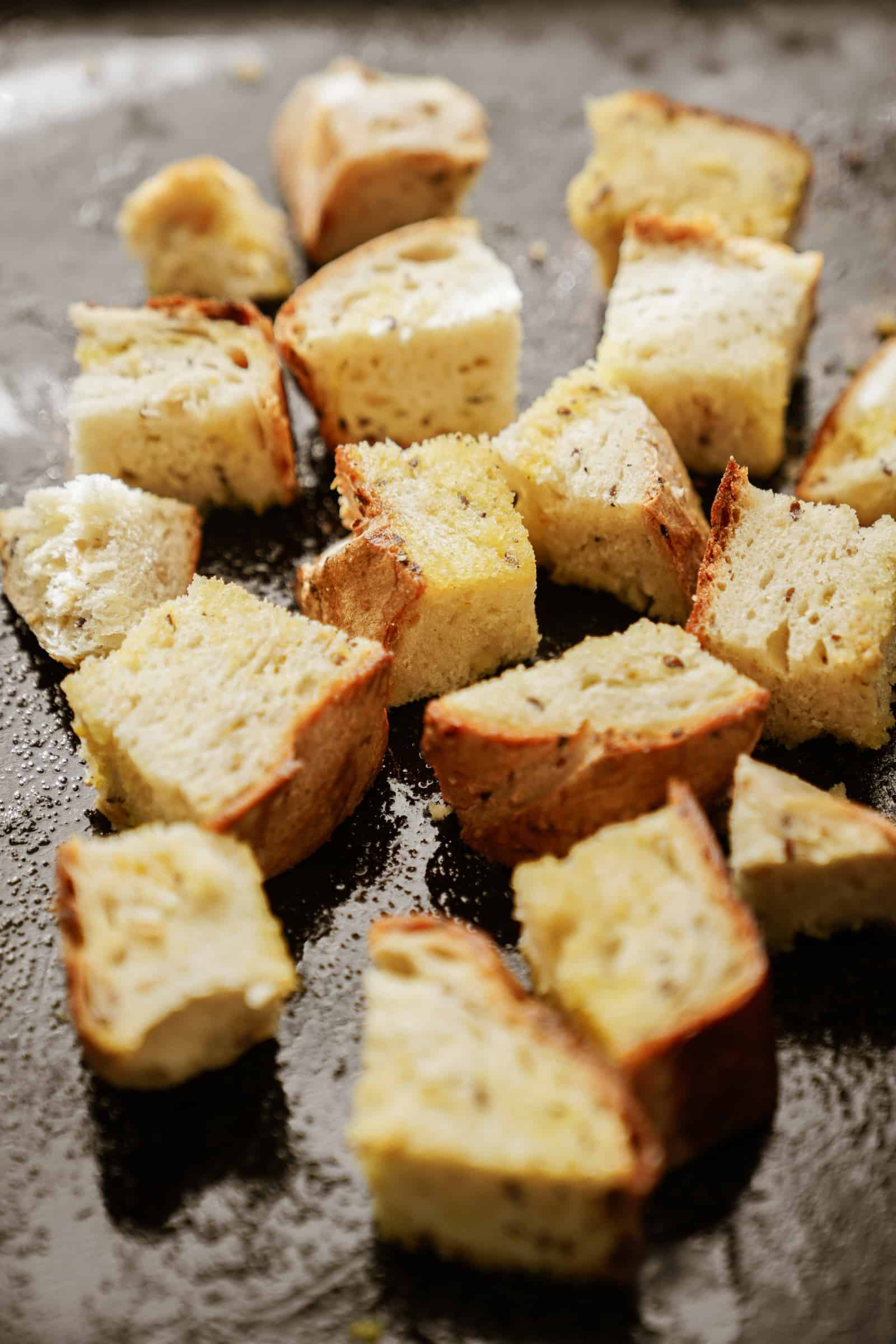 Crispy croutons on a baking sheet