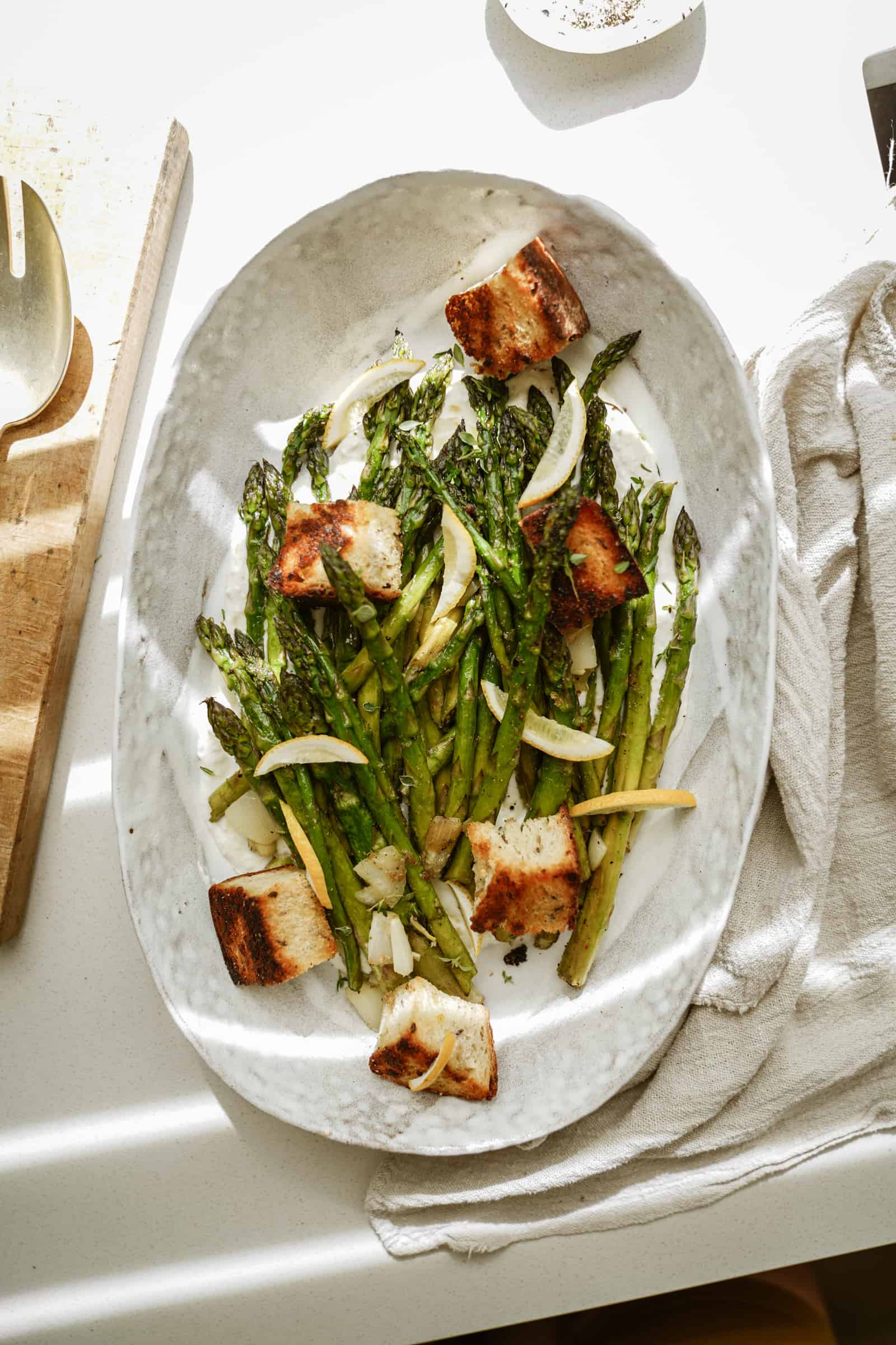 Greek marinated asparagus in serving dish