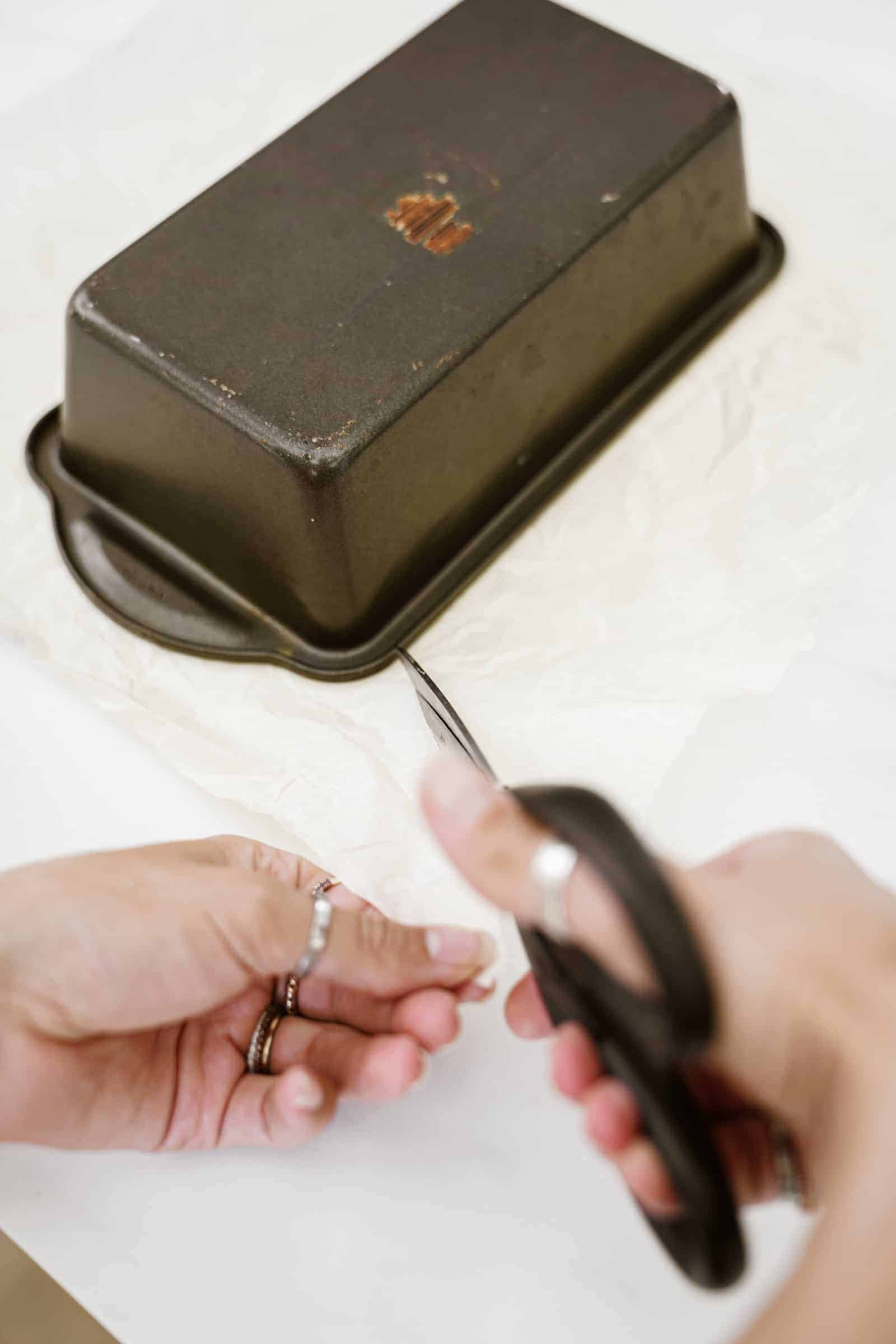 Lining baking tin with parchment paper