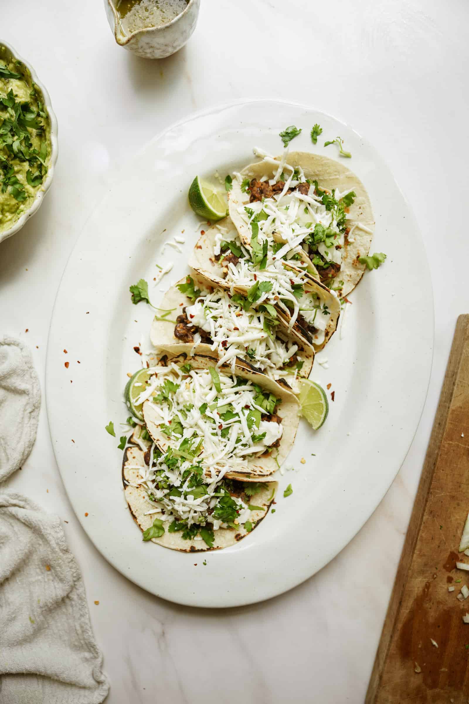 Vegetarian black bean tacos on a platter 