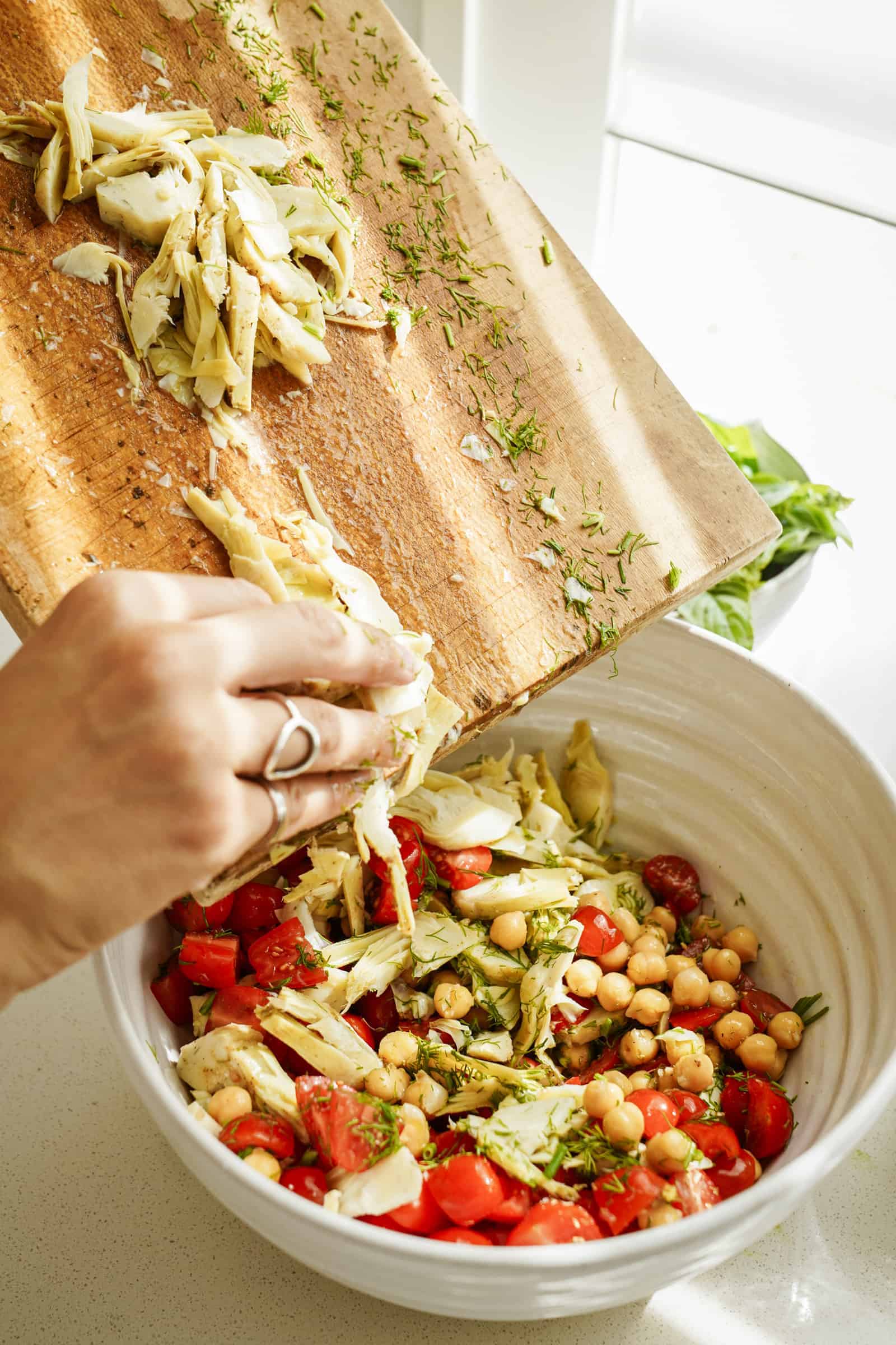 Adding artichokes to a salad recipe