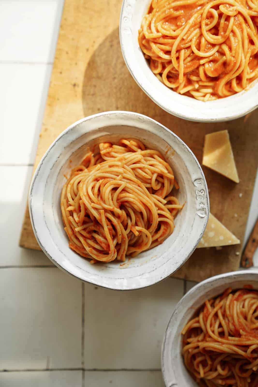 Bowls of spaghetti on a counter