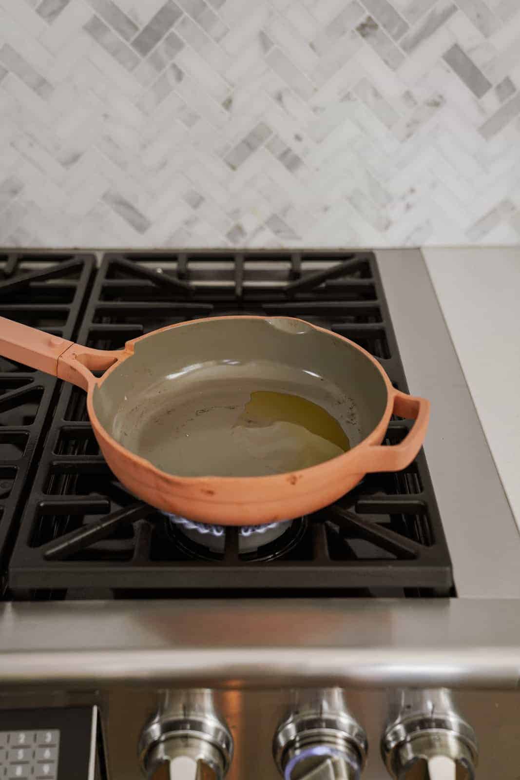 Olive oil in pot on stove