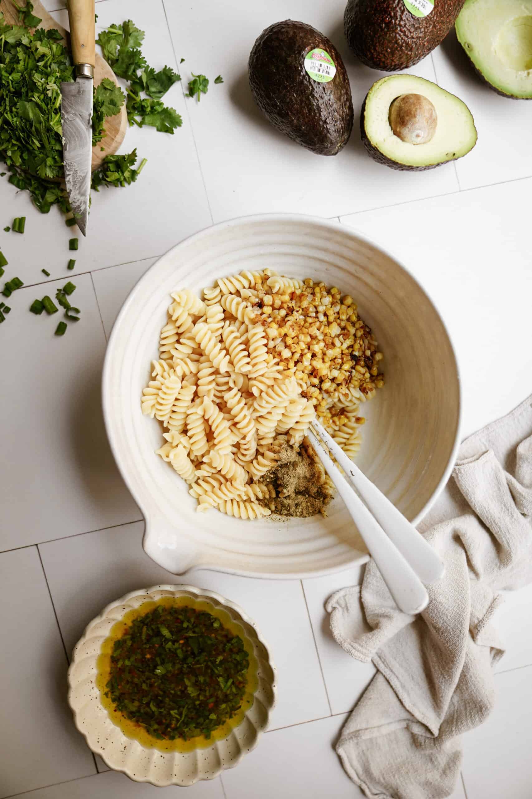 Plain pasta in bowl for avocado pasta salad