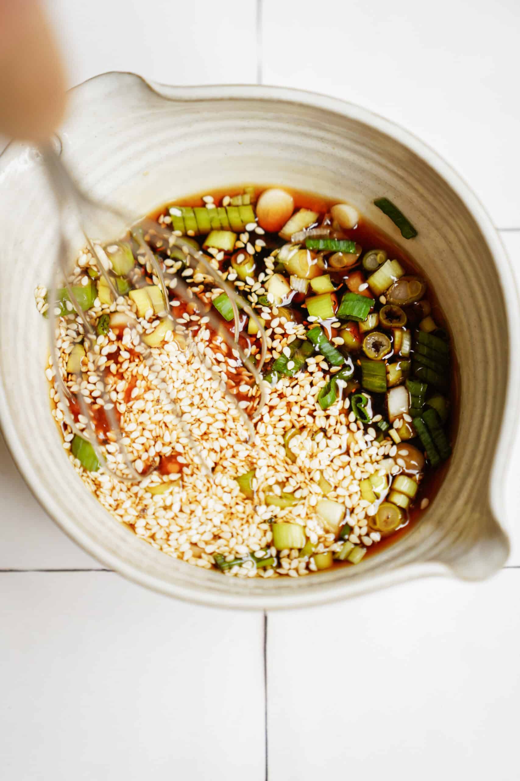 Potsticker sauce in a bowl being mixed