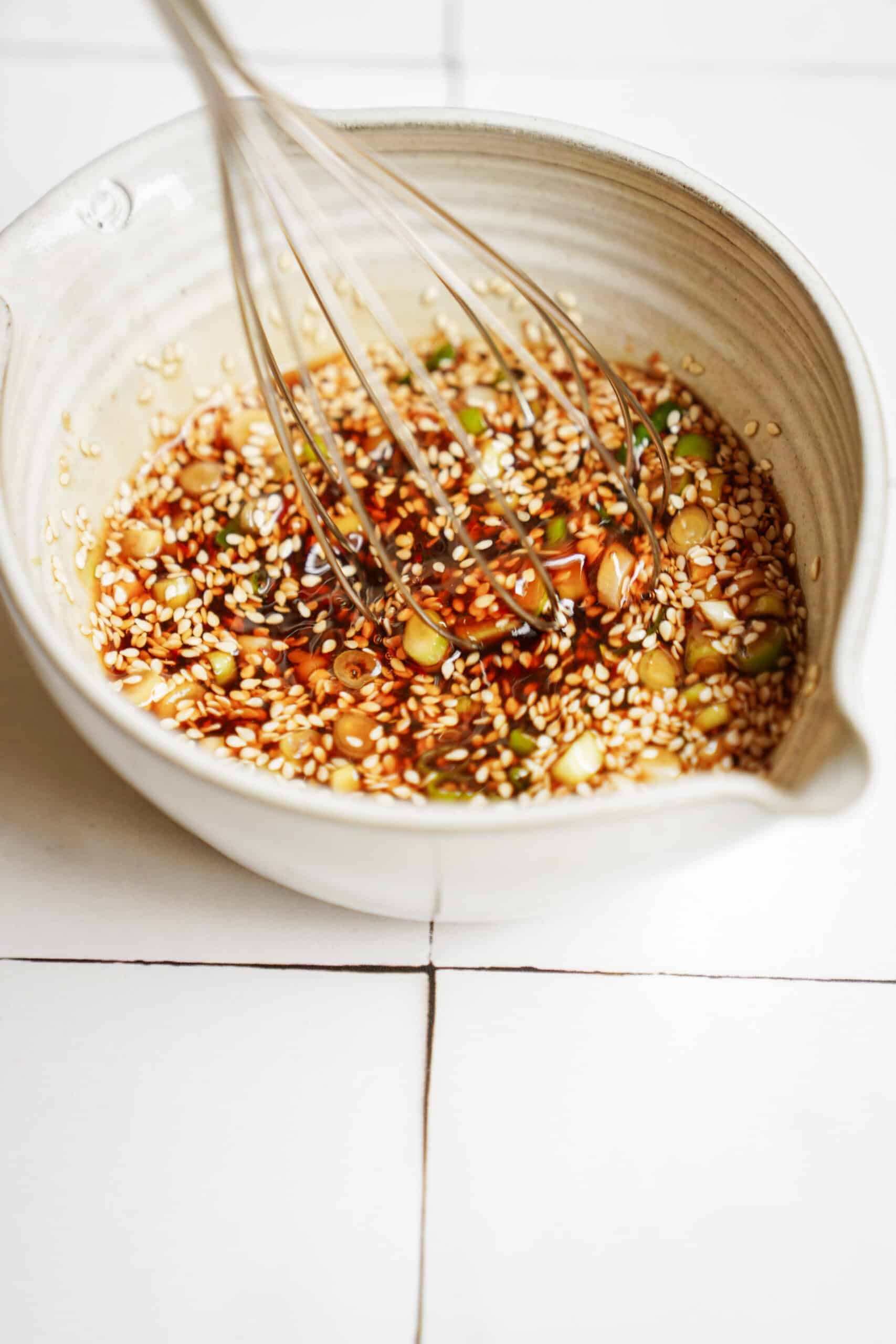 Potsticker sauce in a bowl being mixed