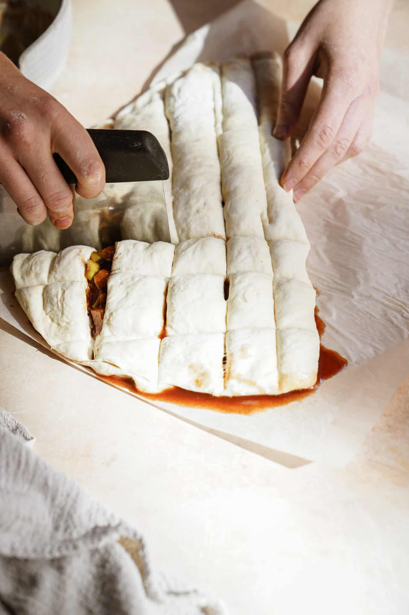 Dough folded over for apple fritters