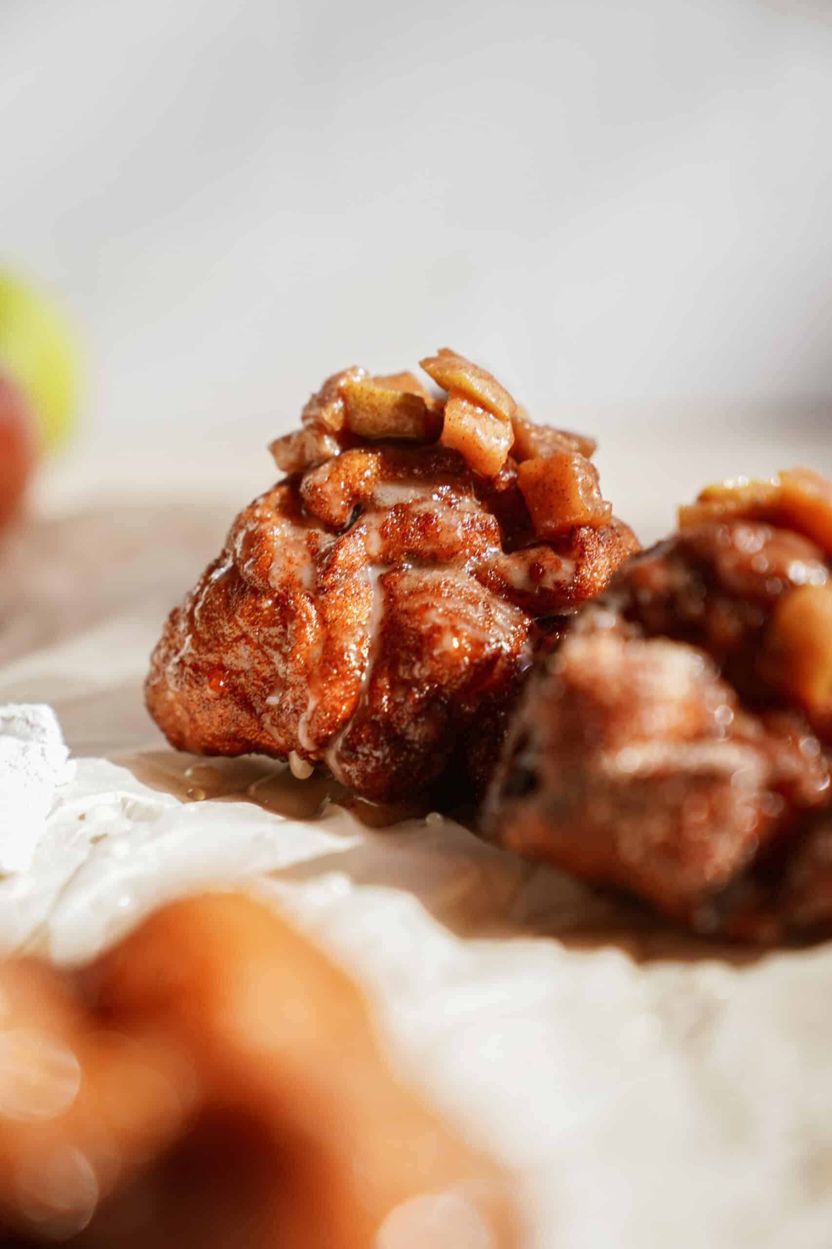 Apple fritters on parchment 