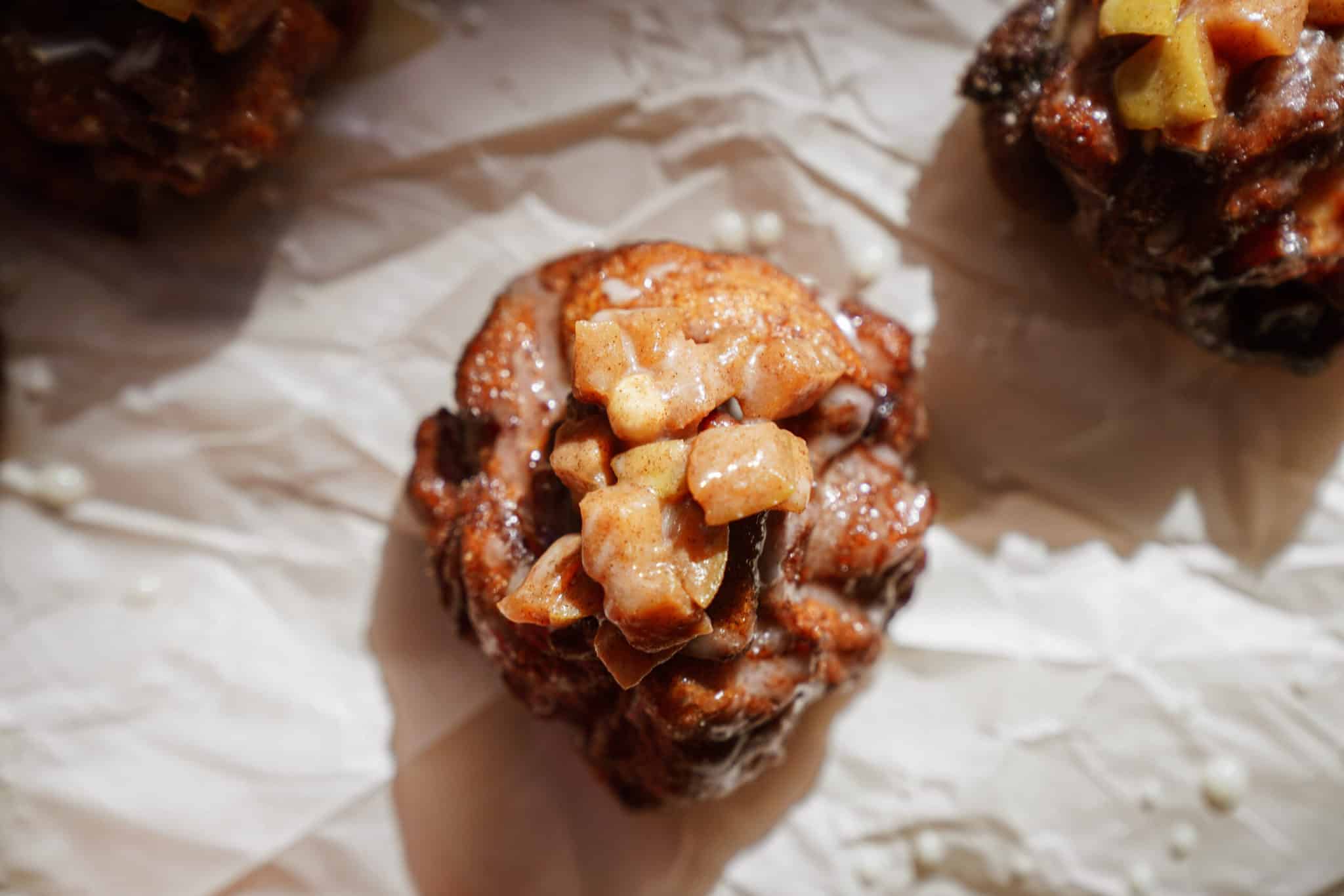 Apple fritters on parchment paper 