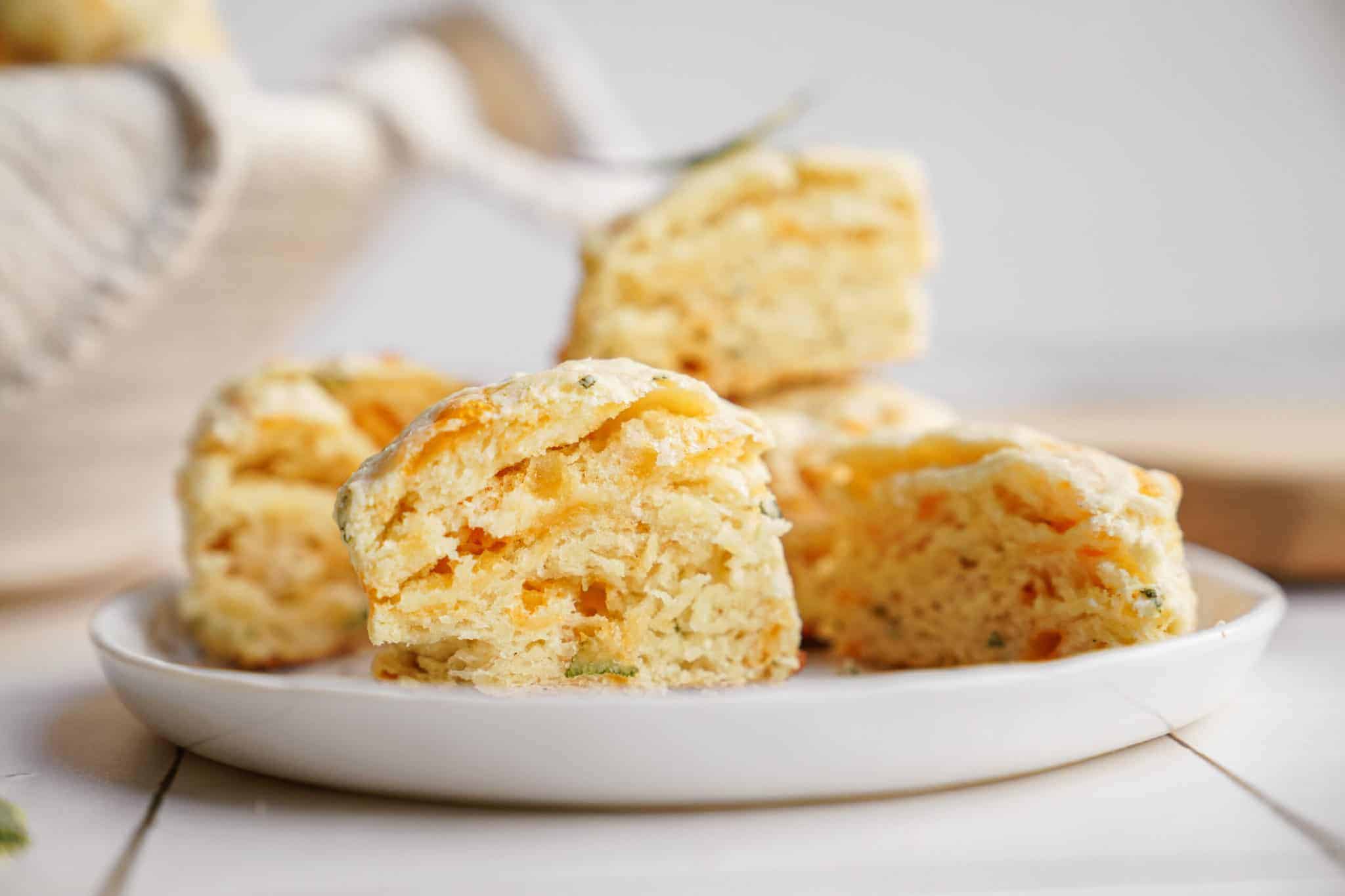 Cheddar biscuits on a white plate