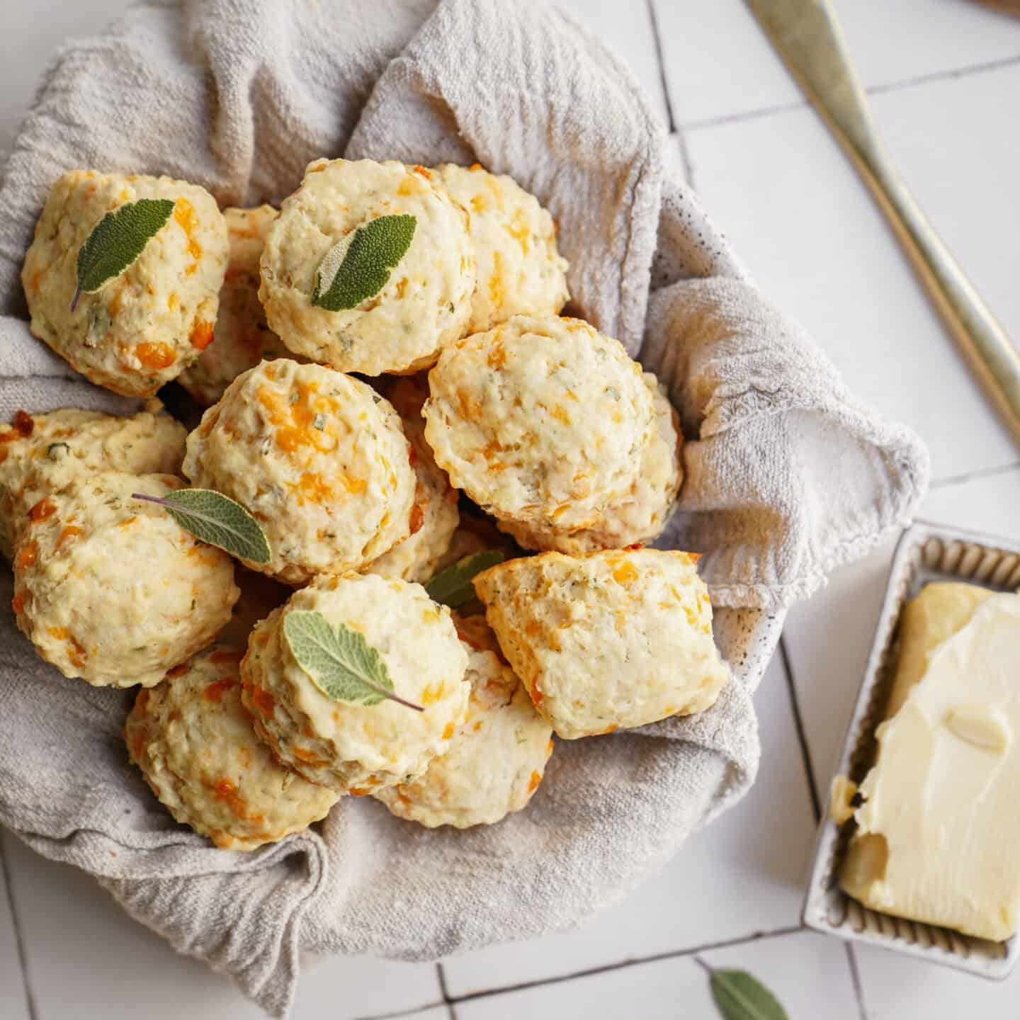 Cheddar biscuits on a white plate