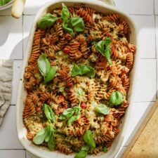 Pesto pasta bake in a casserole dish