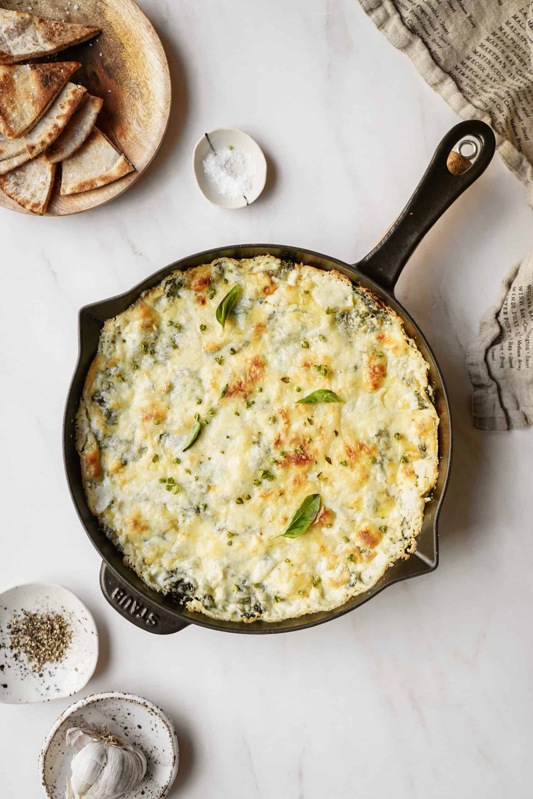 Spinach and Artichoke Dip in cast iron dish