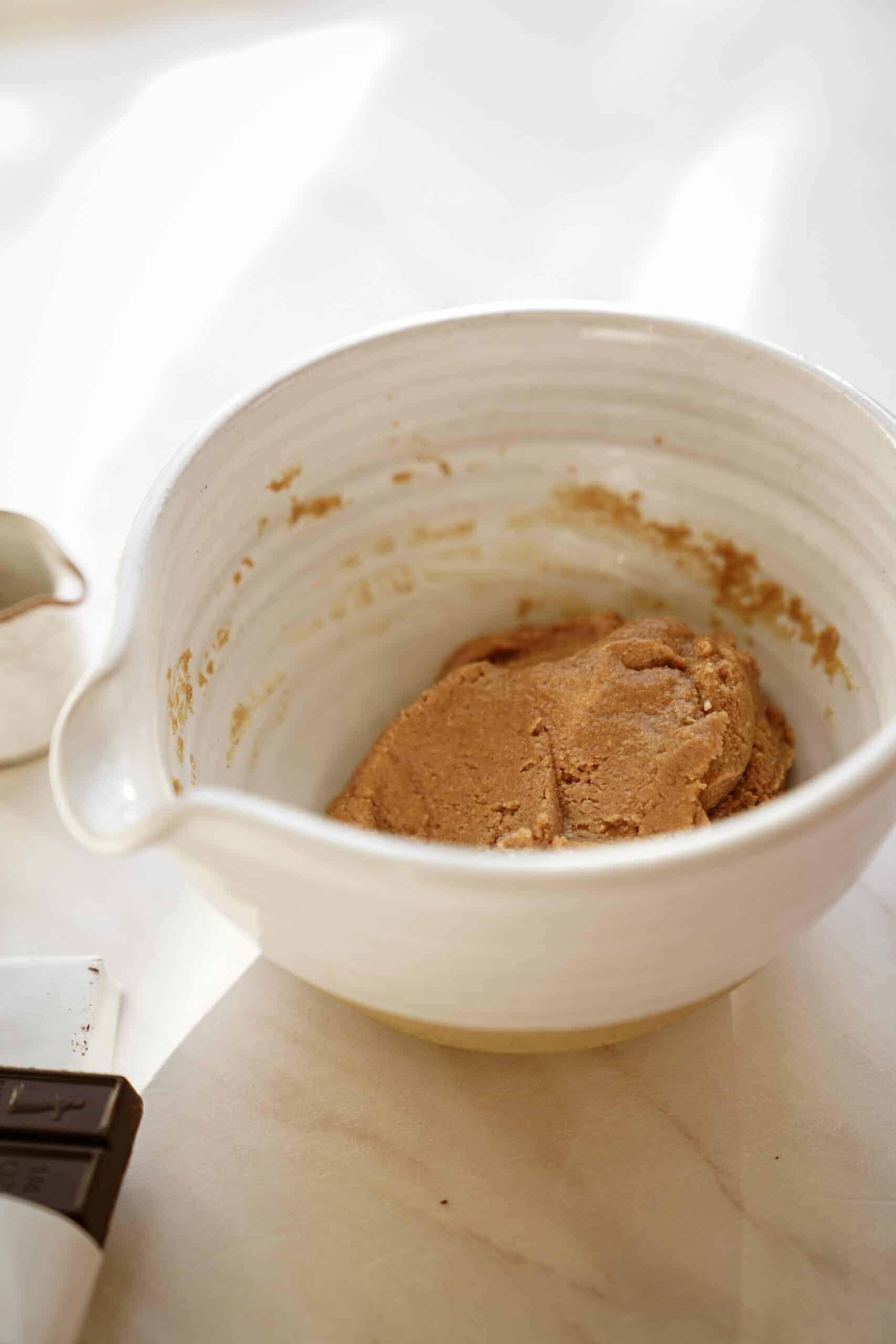 Ingredients for Homemade Reese's Eggs in a white bowl