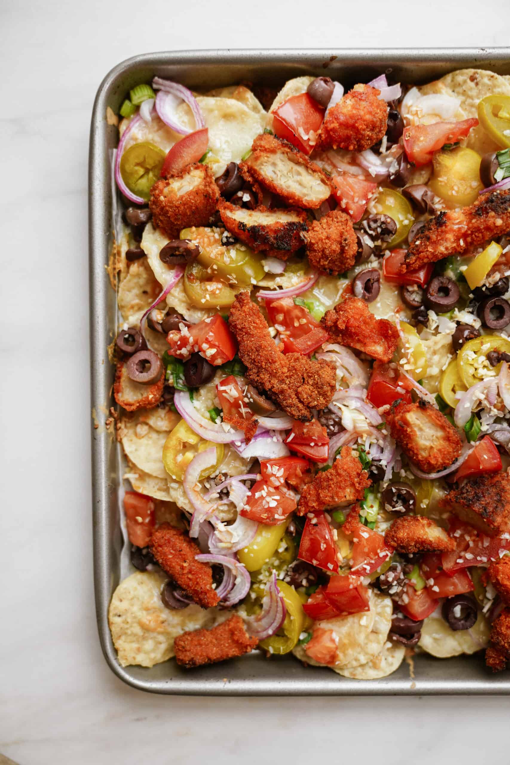 Buffalo chicken nachos on a tray