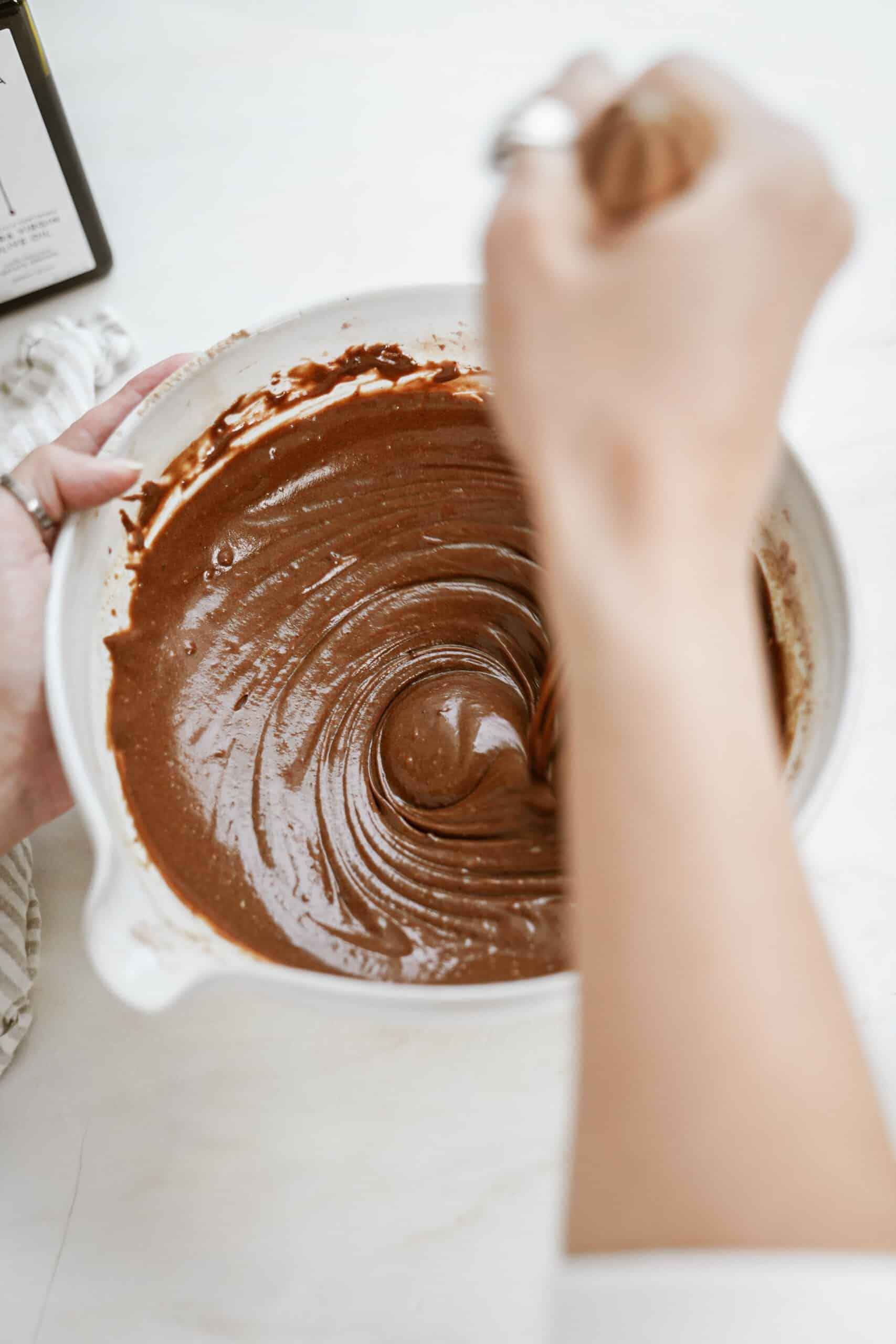 Cake ingredients being mixed in a bowl