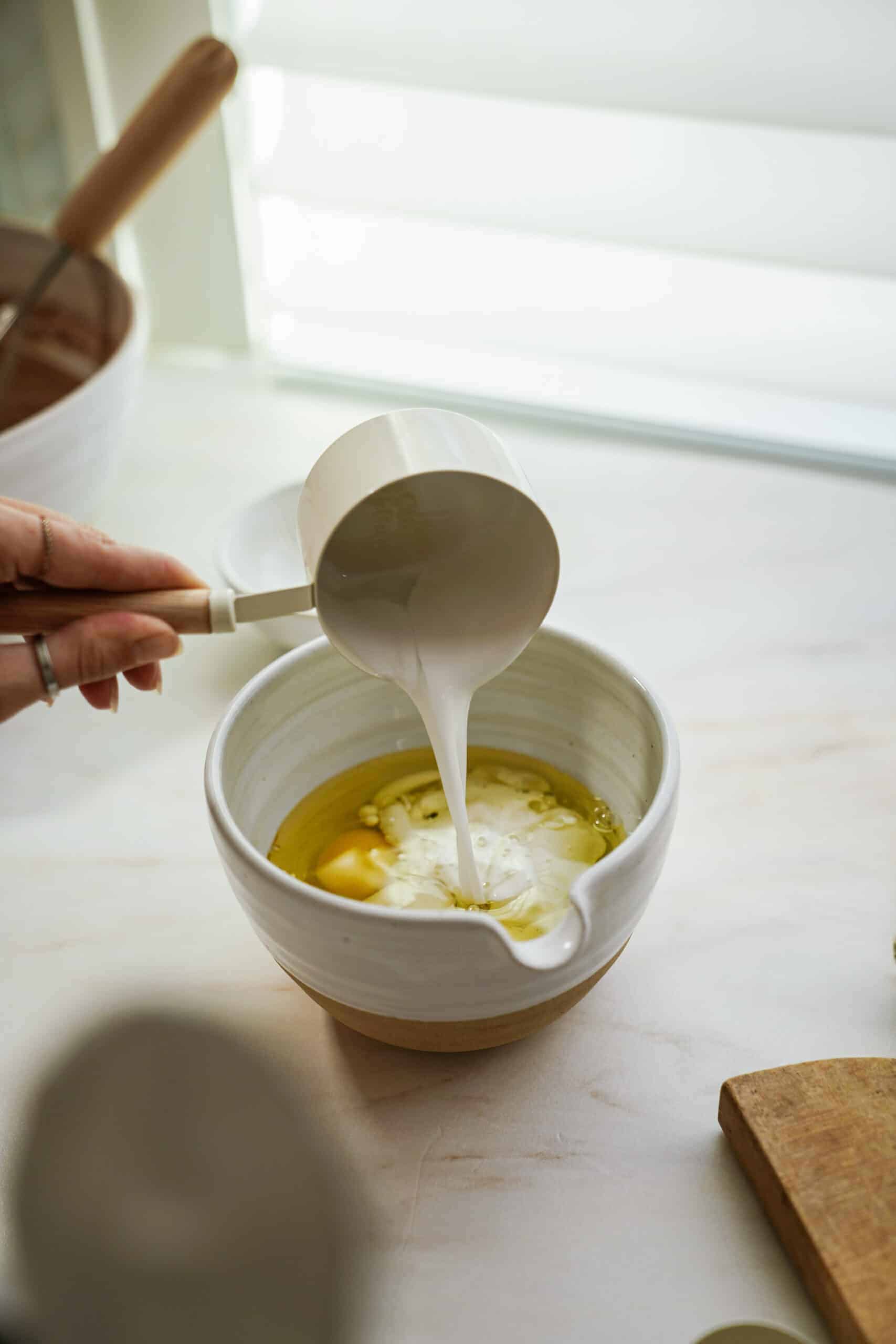 Wet ingredients for gluten-free chocolate cupcakes in a bowl