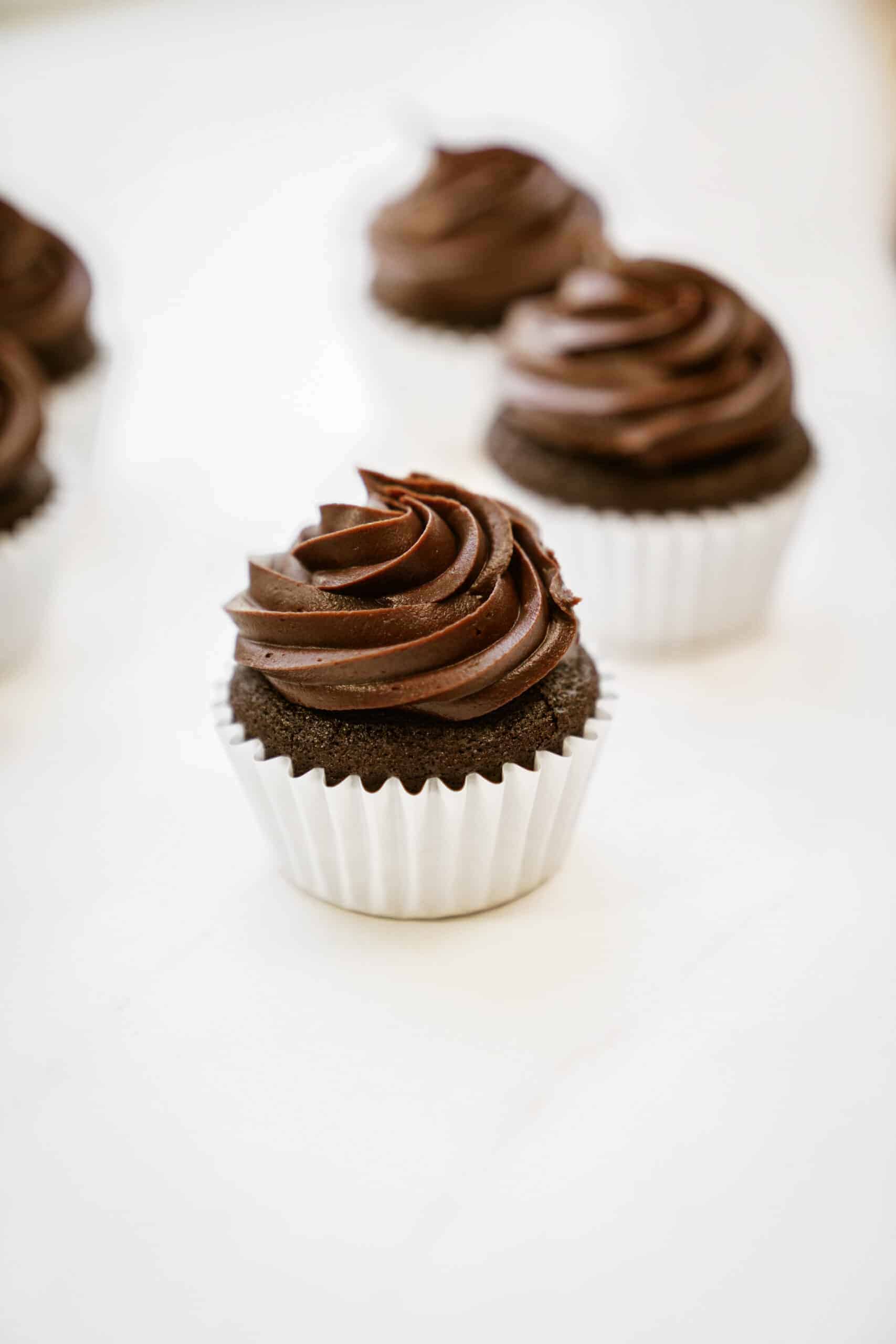 Gluten-free chocolate cupcakes on counter