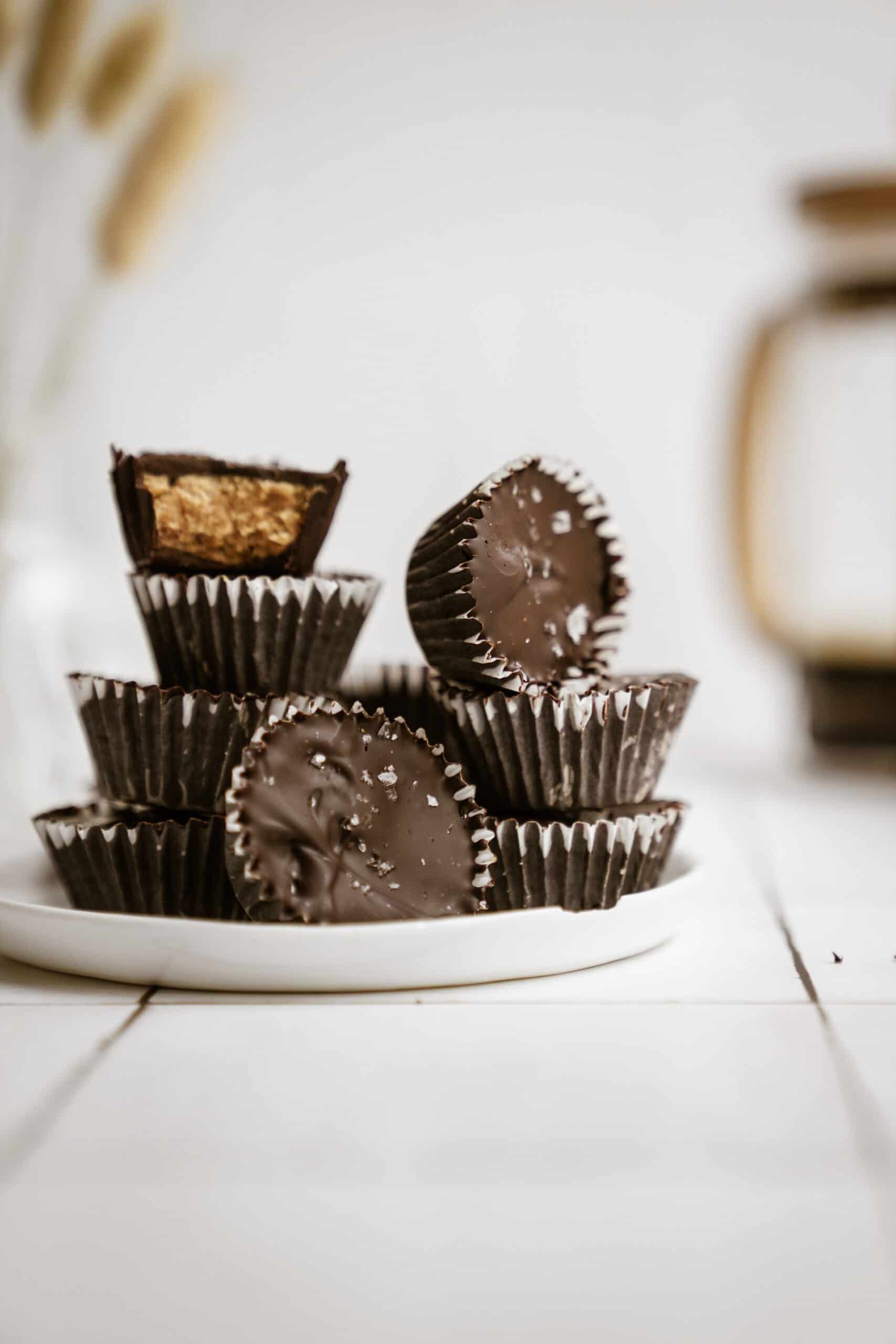 Homemade Peanut Butter Cups stacked on a plate