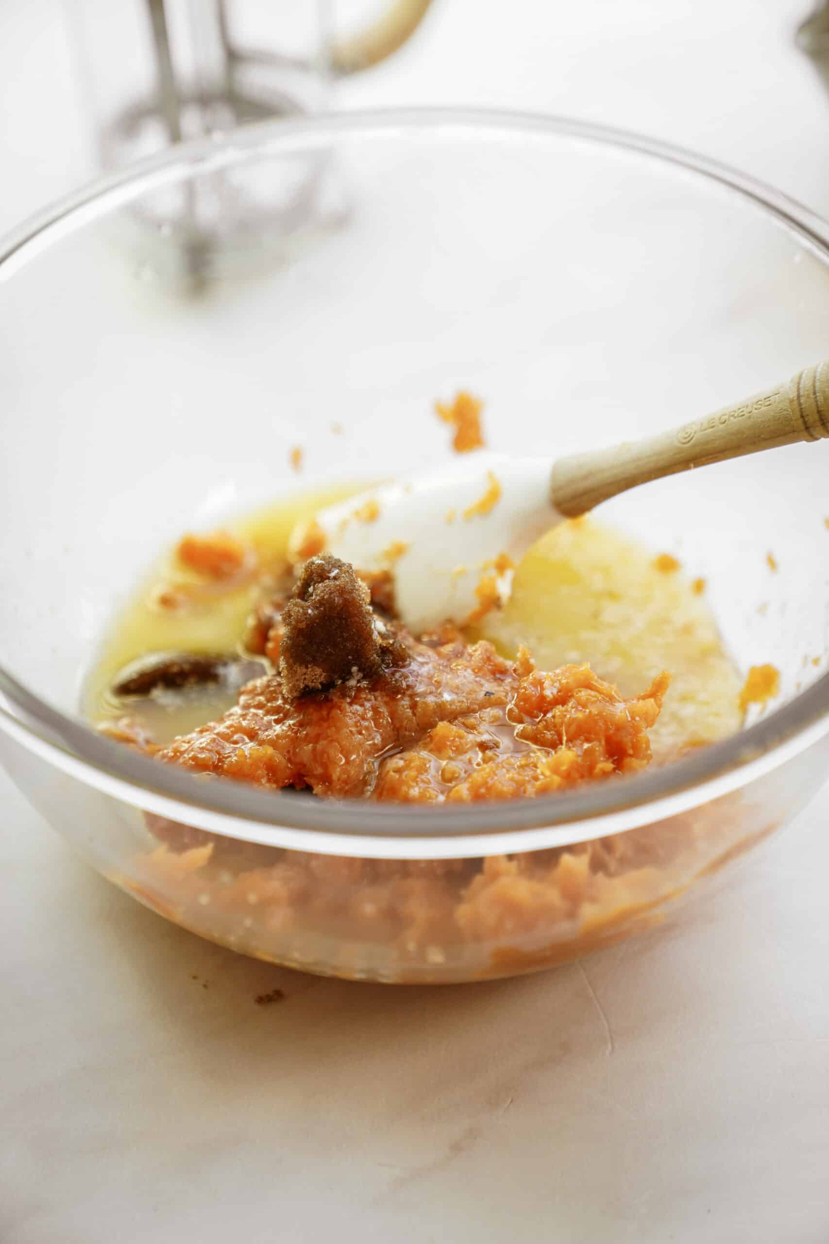 Wet ingredients for sweet potato muffins in a bowl