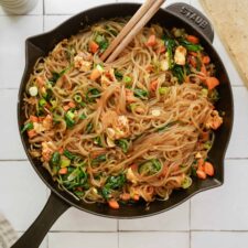 Vegan Japchae in a cast iron pot on counter