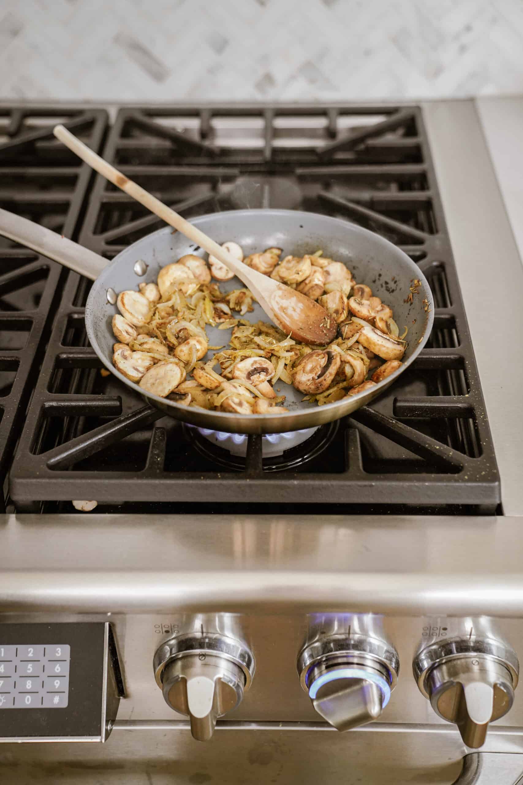 Mushrooms added to pan with onions 