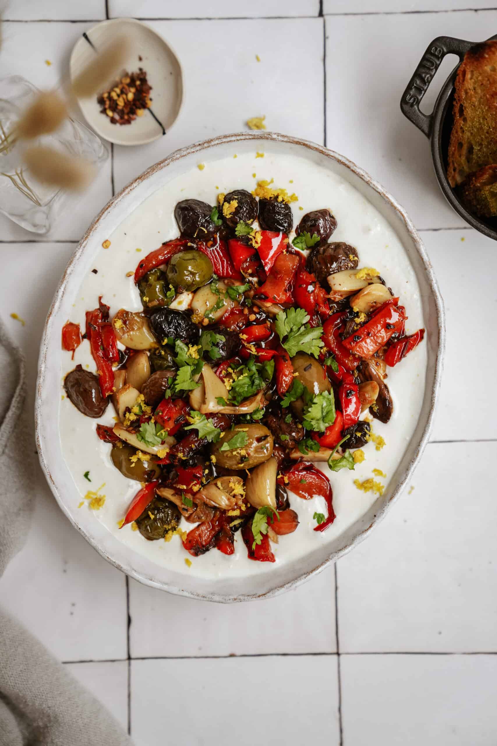 Whipped feta with roasted veggies in a serving bowl