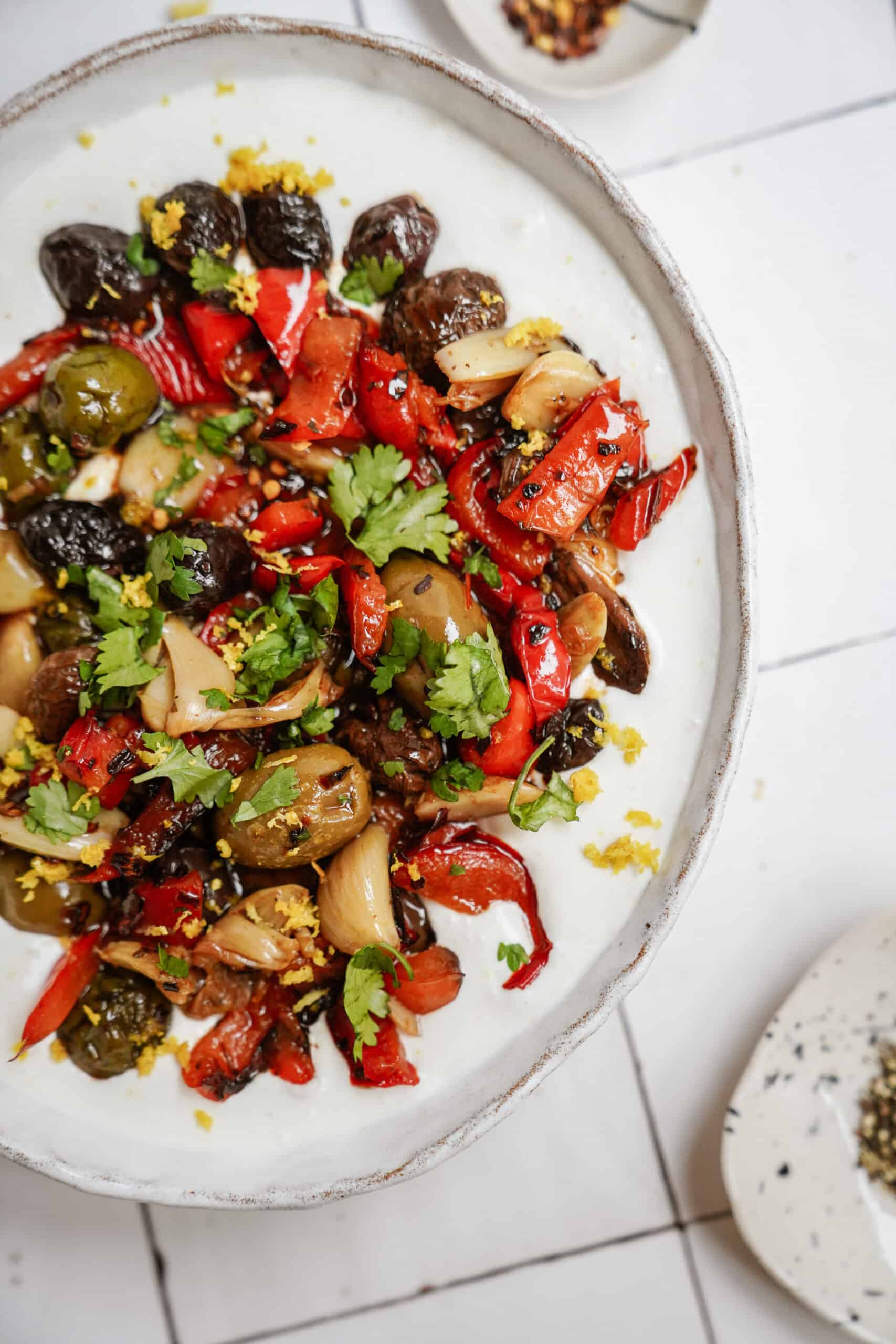 Whipped feta with roasted veggies in a serving bowl