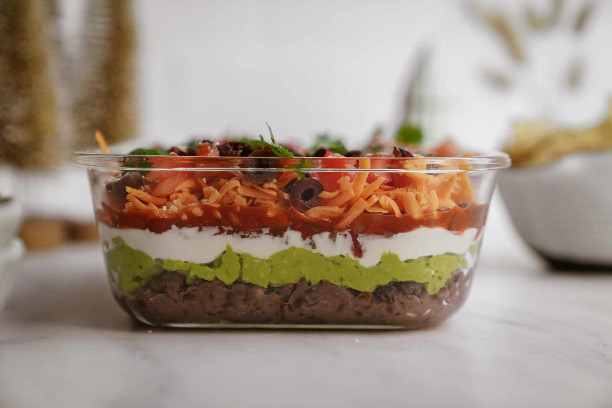 Side angle of a 7 layer dip on countertop