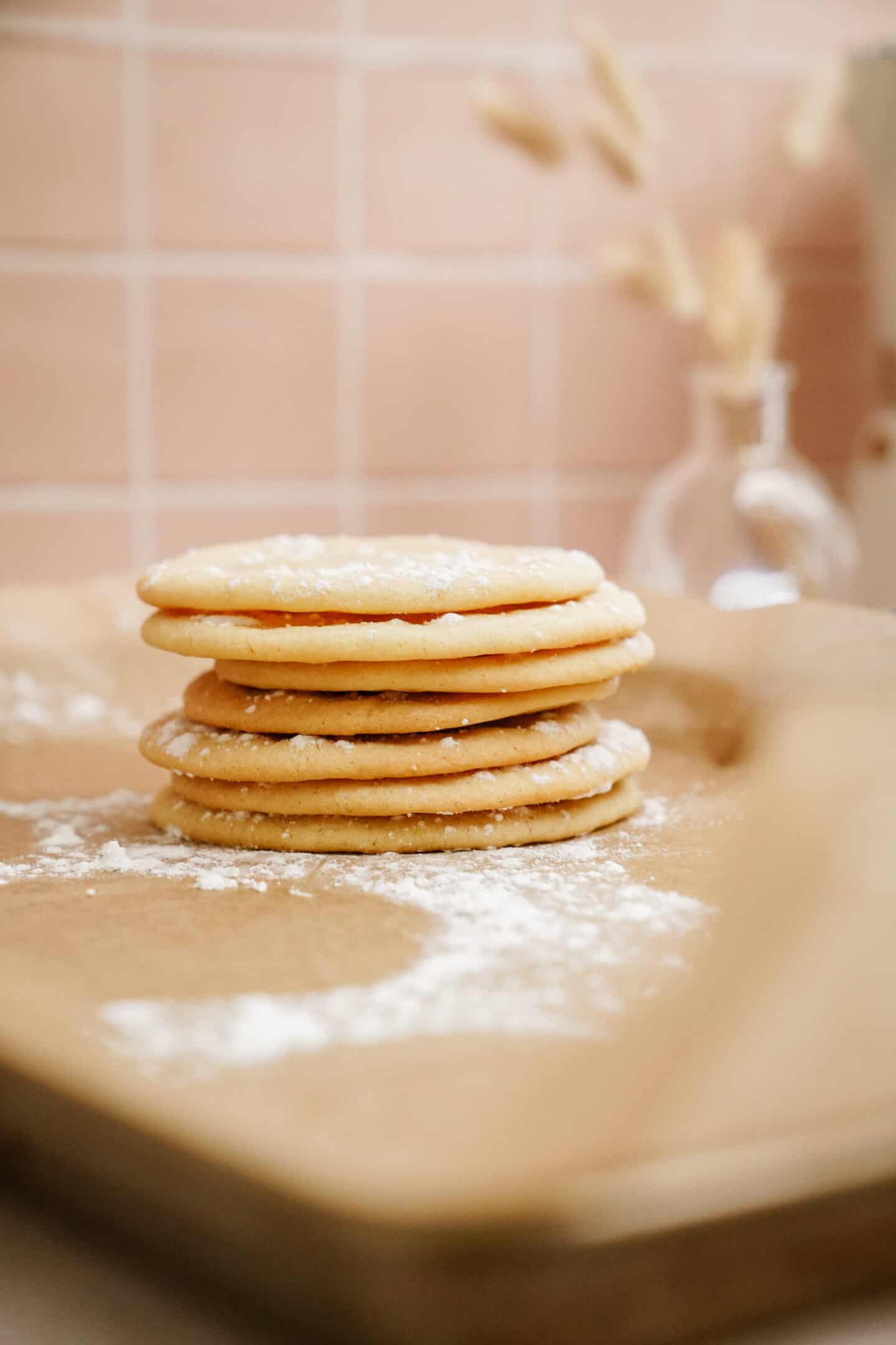 Stack of holiday sugar cookies on a surface