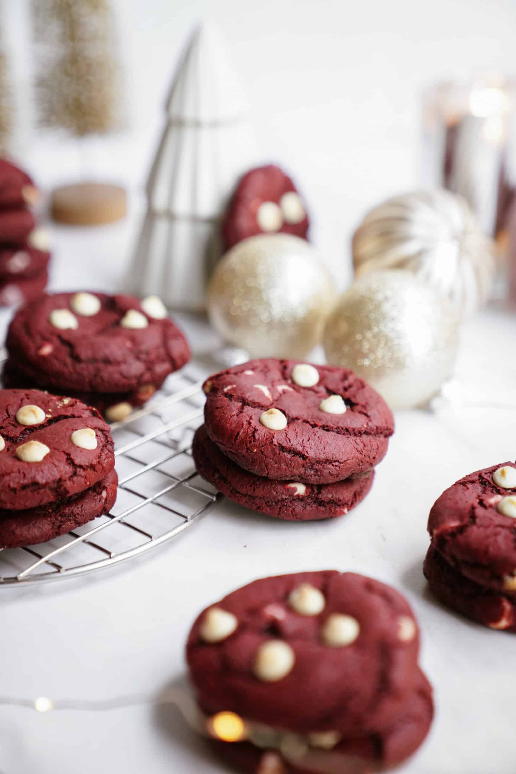 Red velvet cookies scattered on counter