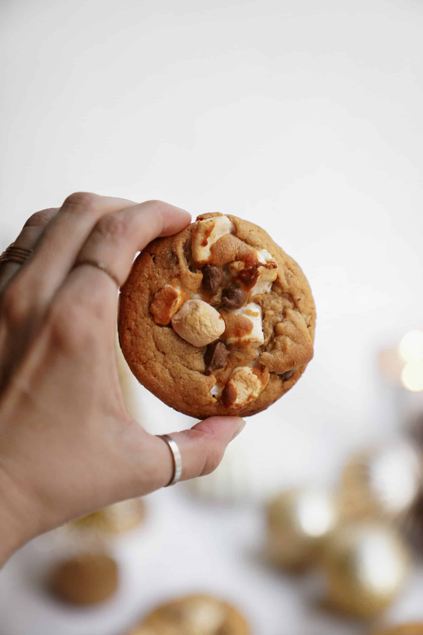 S'more cookie recipe being held by a hand