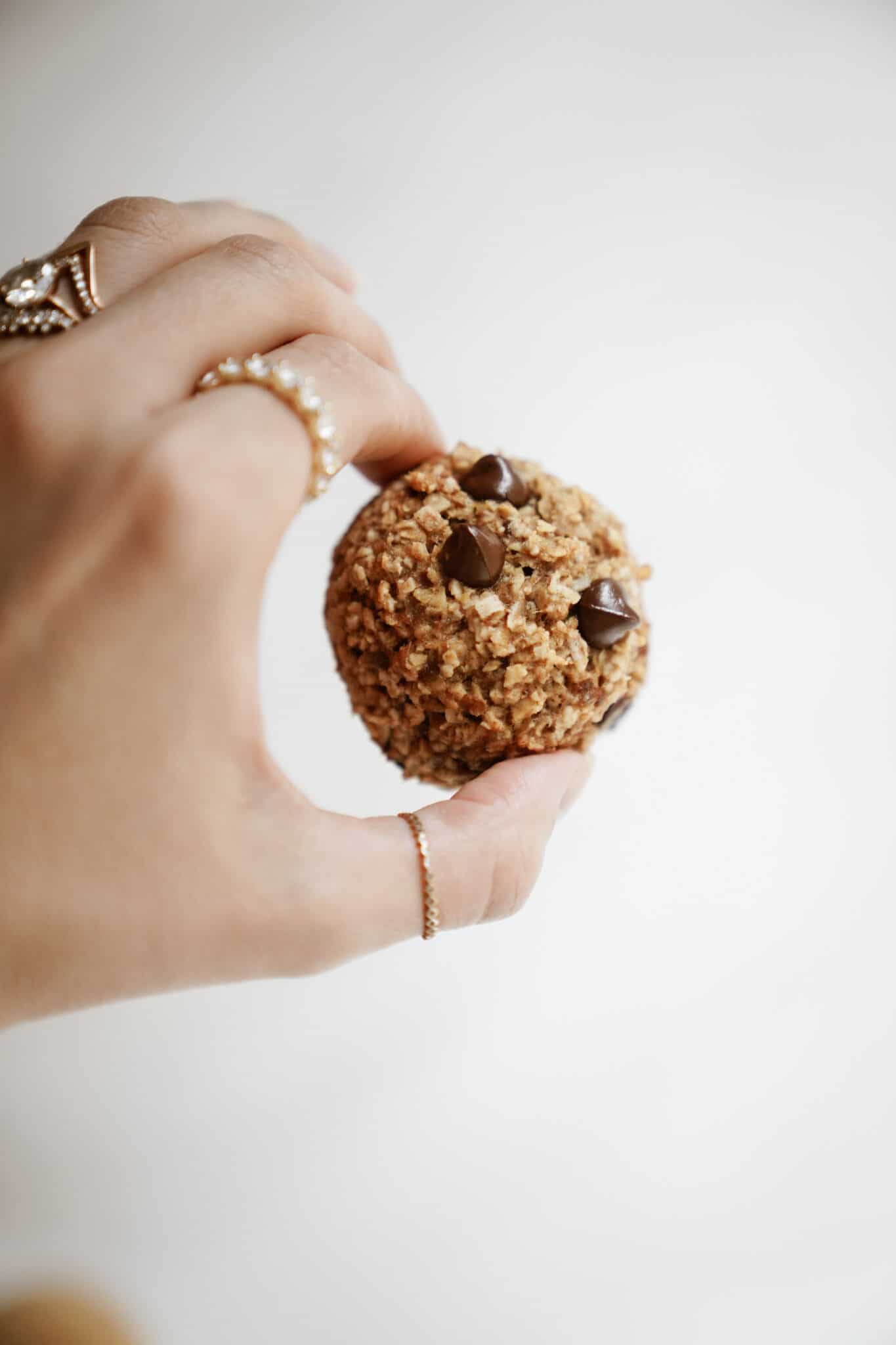 Hand holding a savory muffin 